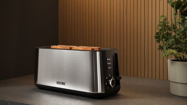 Ein silberner Toaster mit vier Toastscheiben obenauf steht auf einer Arbeitsplatte.