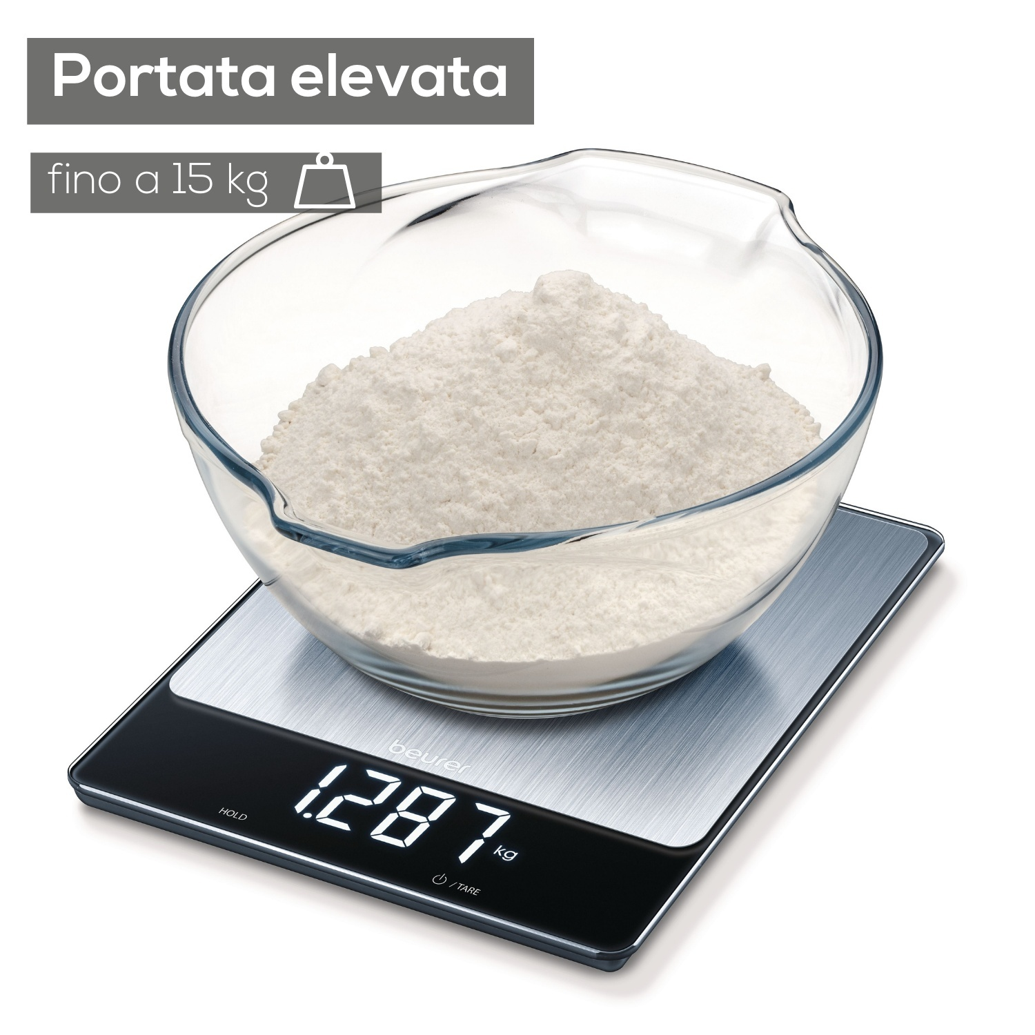 Una bilancia da cucina digitale con una ciotola di farina. Il display mostra 1,287 kg.