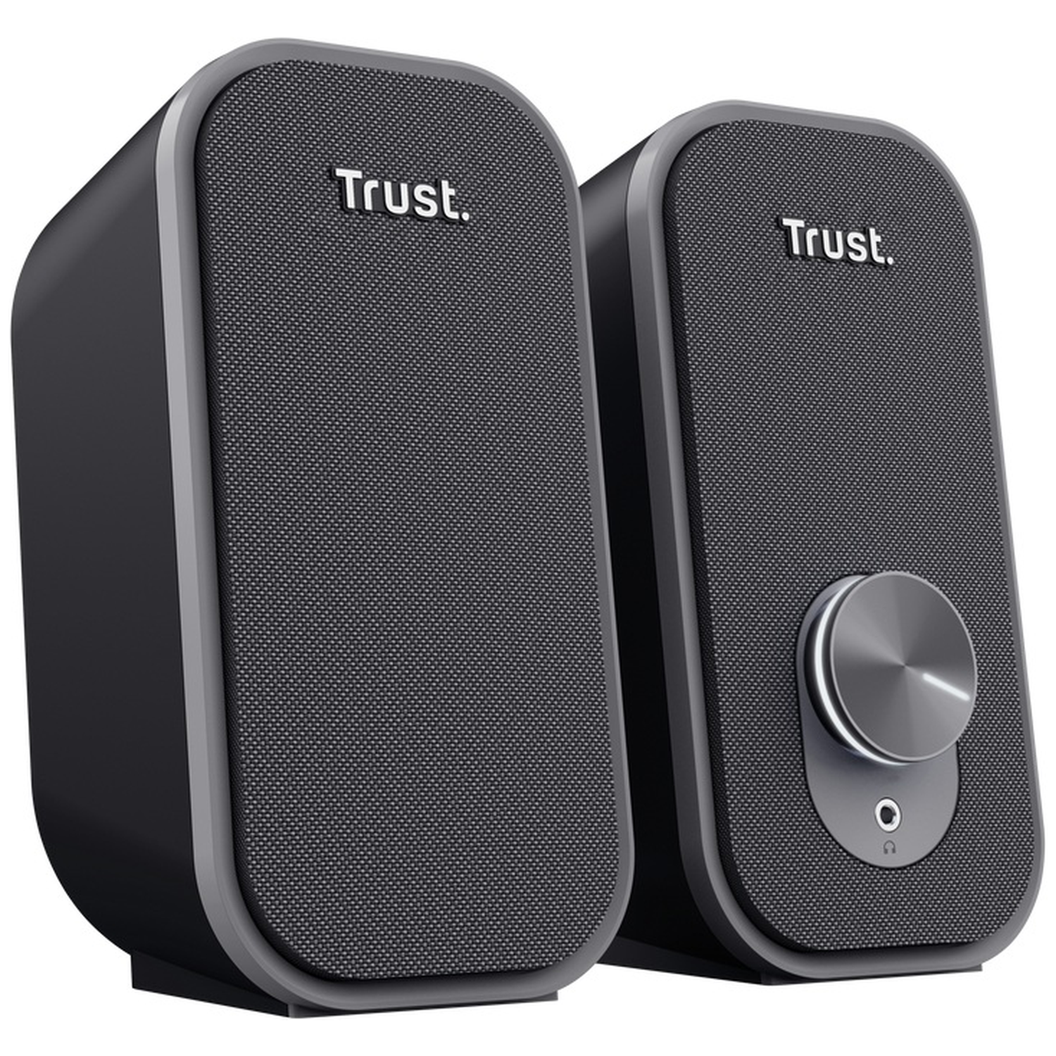 Two black Trust computer speakers with fabric fronts. One has a volume knob.