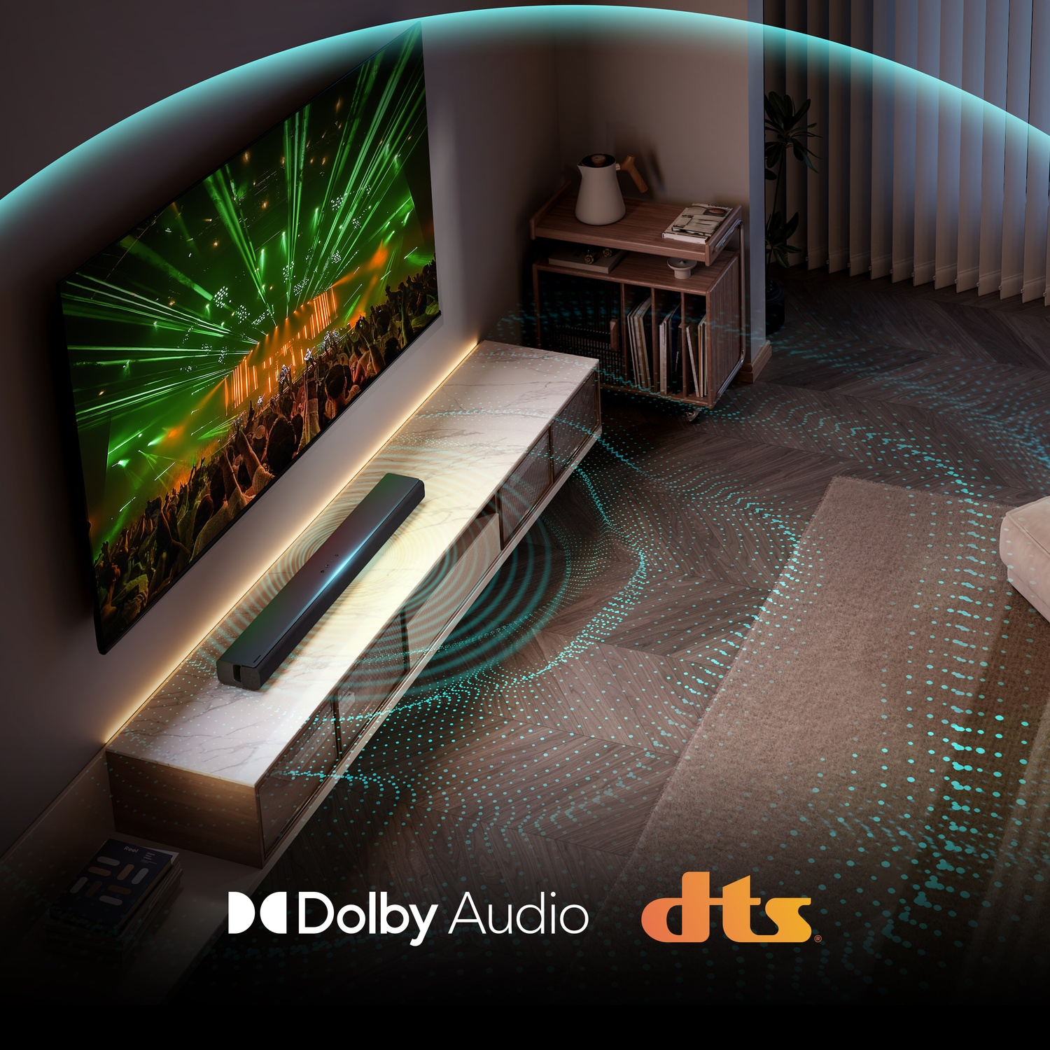 Una stanza buia con una TV che mostra un concerto. Una soundbar è davanti.