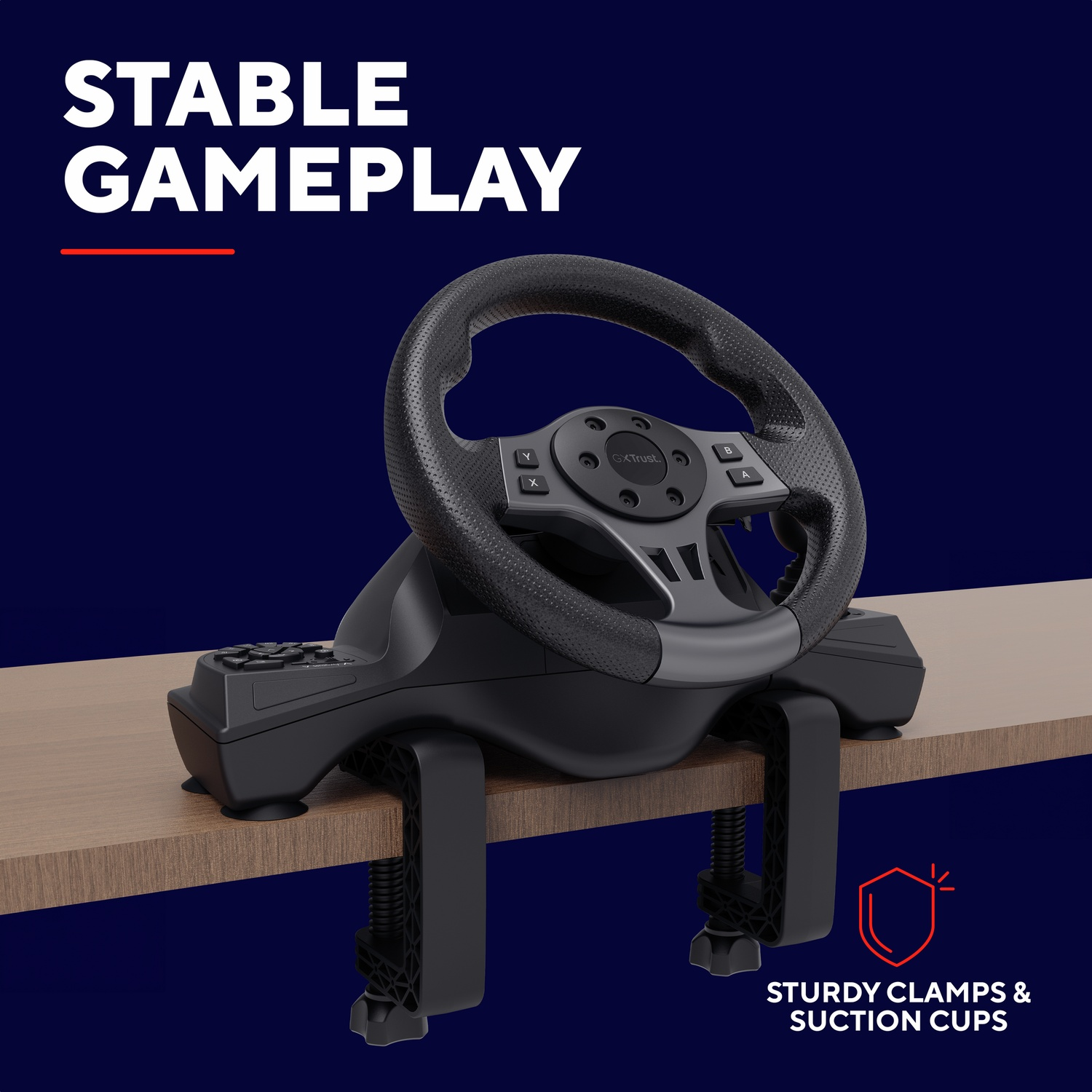 Un volant de jeu noir fixé à un bureau en bois.
