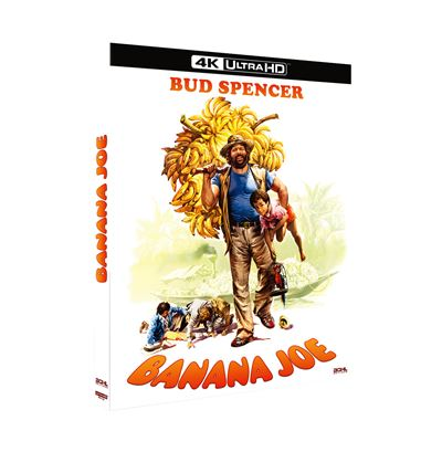 Bud Spencer porte une régime de bananes sur l'épaule et un enfant dans ses bras.