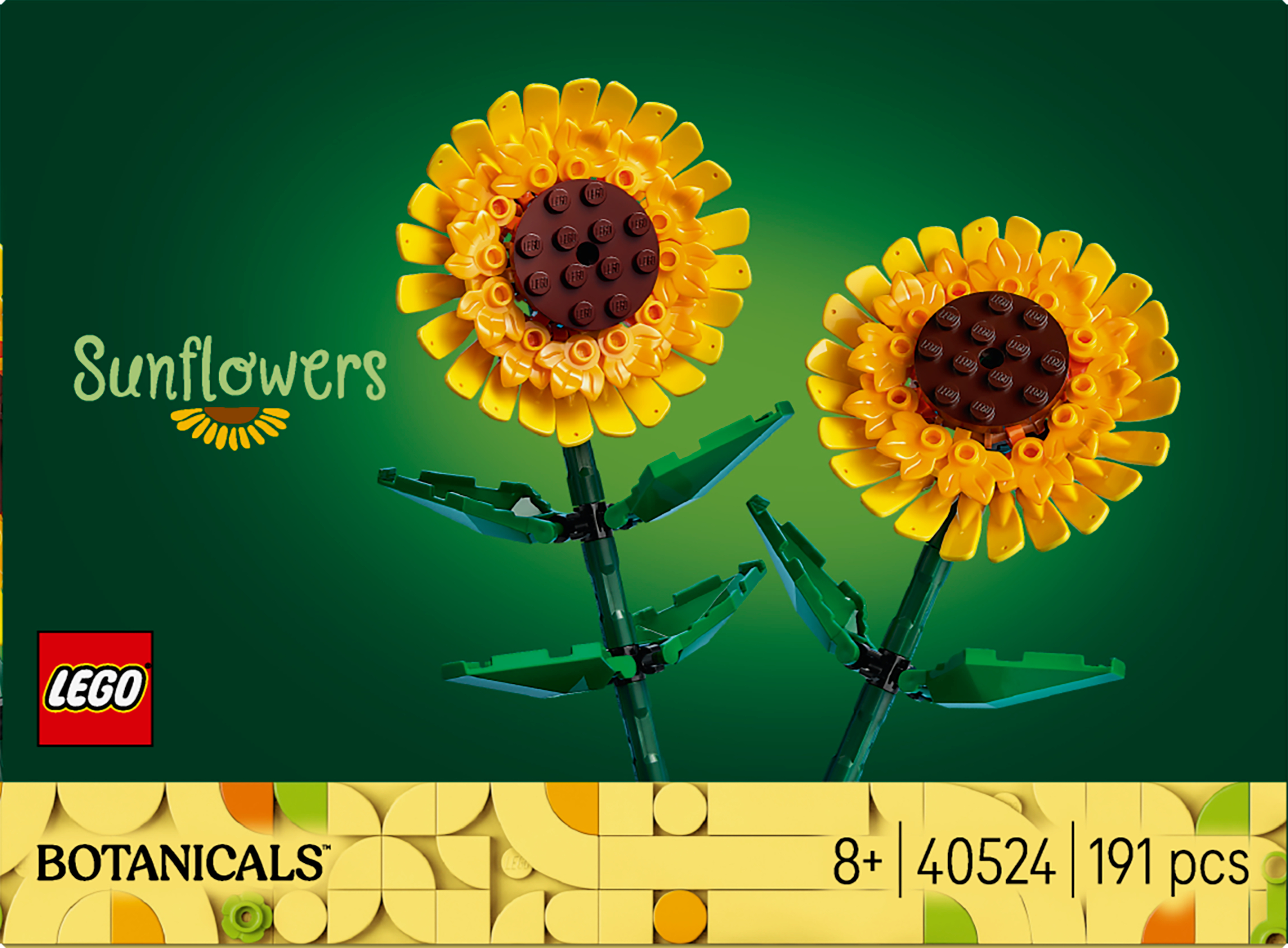Zwei LEGO Sonnenblumen mit gelben Blütenblättern auf grünem Hintergrund.