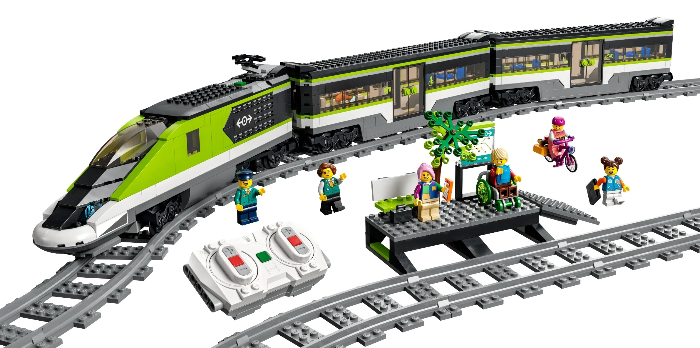 Pociąg Lego z zielonym przodem, pasażerami, stacją i pilotem.