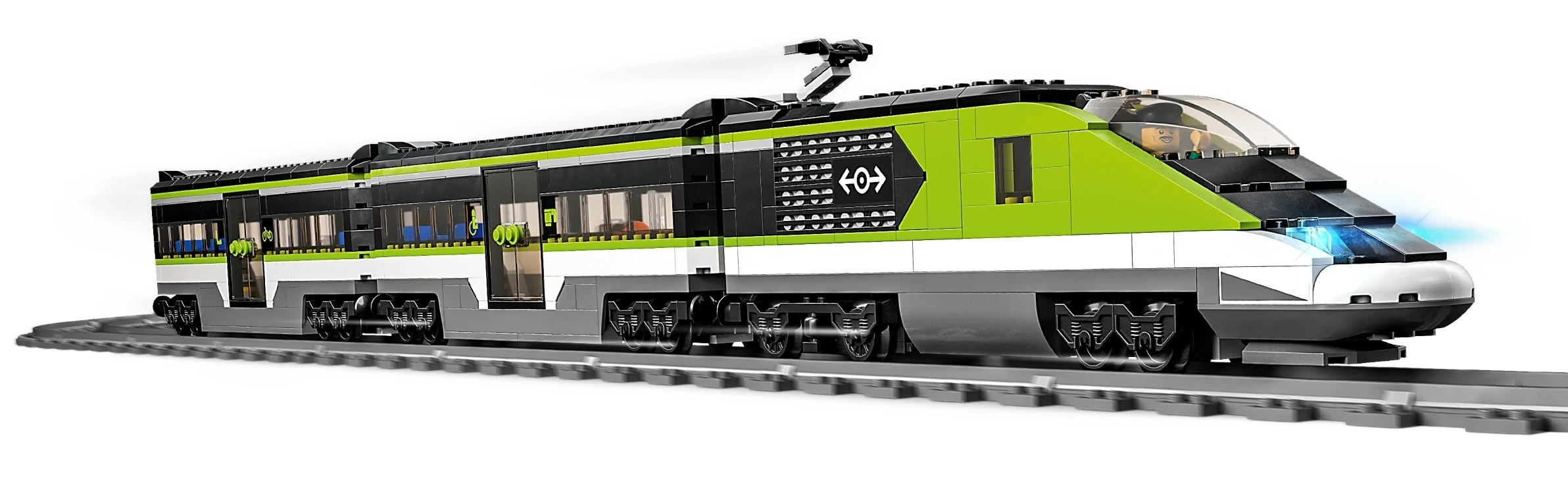 Pociąg Lego w kolorach zielonym, czarnym i białym na torach z motorniczym.