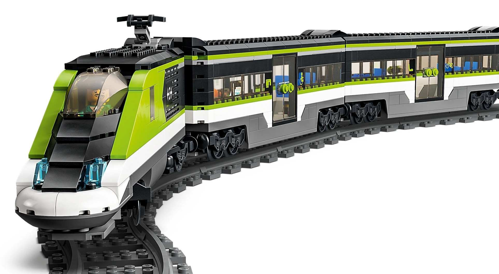 Zielony i biały pociąg Lego na torach, z detalami okien i kół.