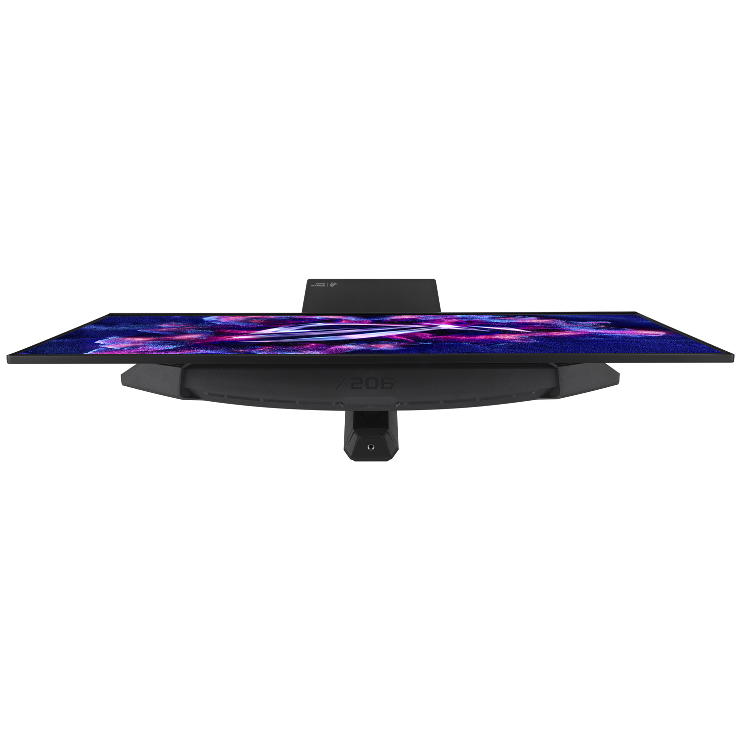 A black monitor displaying a colorful wallpaper, viewed from above.
