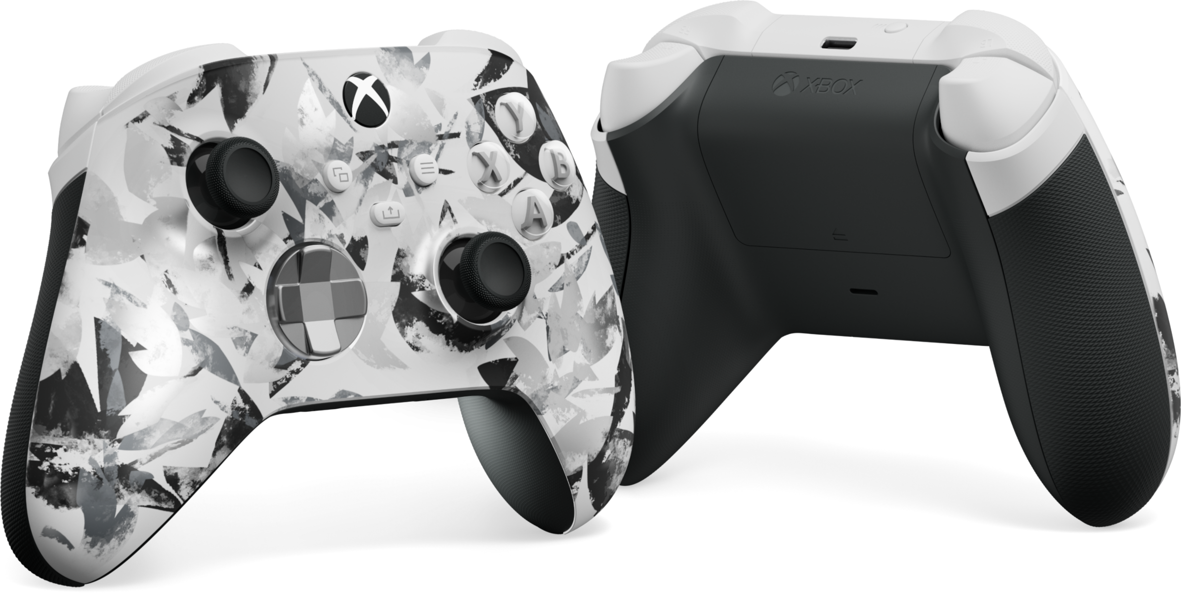Xbox vezérlő fehér álcázó mintával és fekete díszítéssel.