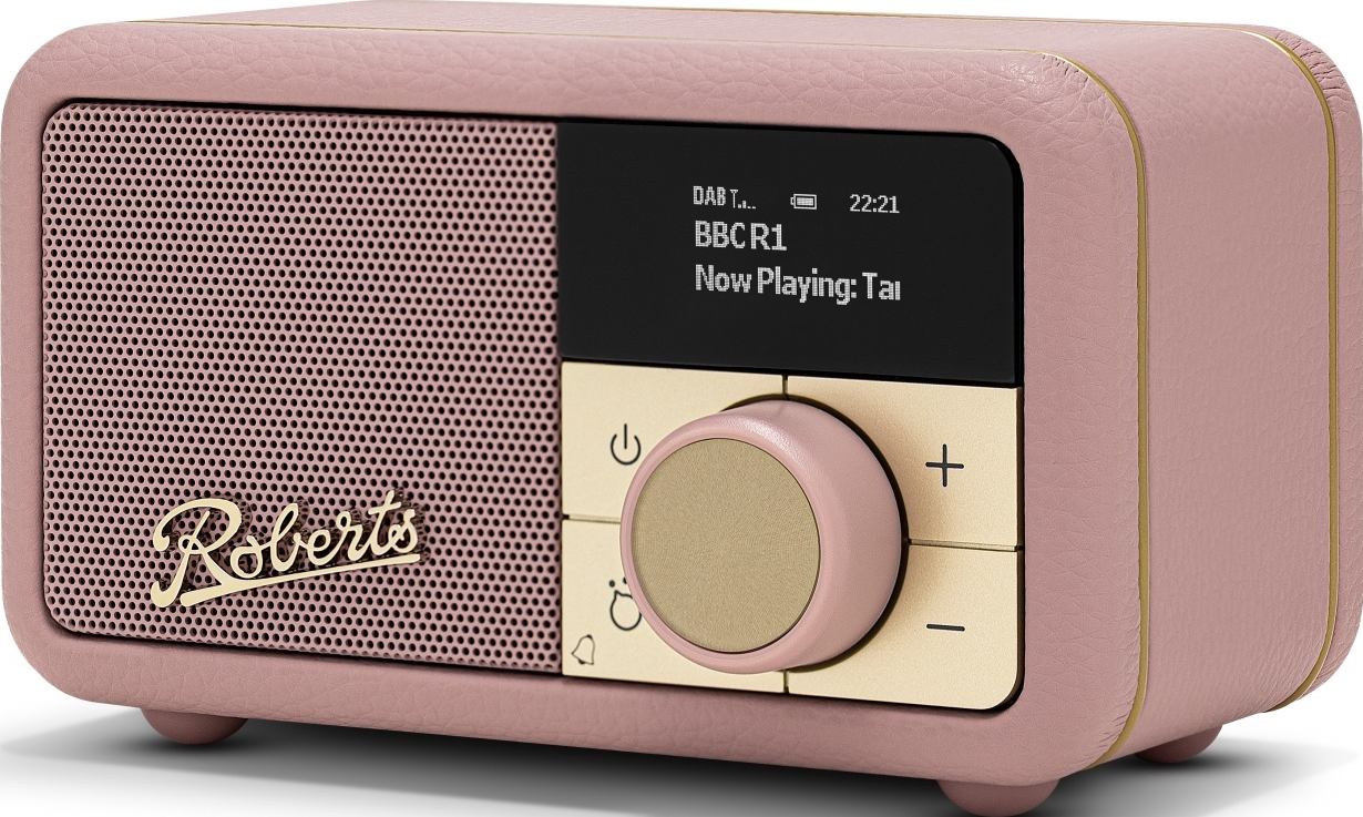 Une radio rose avec des accents dorés et un écran numérique.
