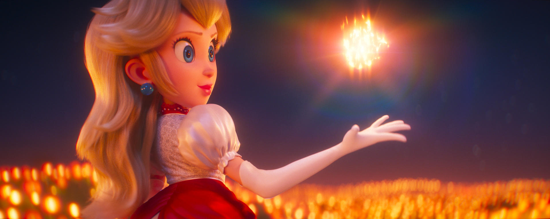 Prinzessin Peach greift nach einem hellen Stern in einem Feld voller Lichter.