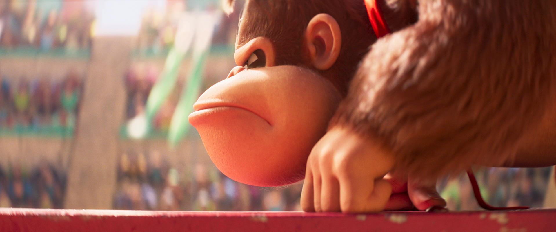 Donkey Kong mit rotem Band im Hintergrund einer Arena.