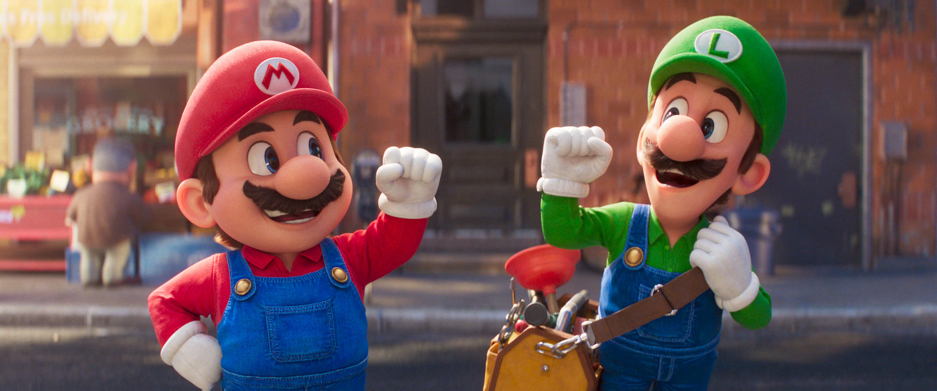 Mario und Luigi stehen auf einer Straße. Mario trägt Rot, Luigi Grün. Sie tragen blaue Latzhosen.