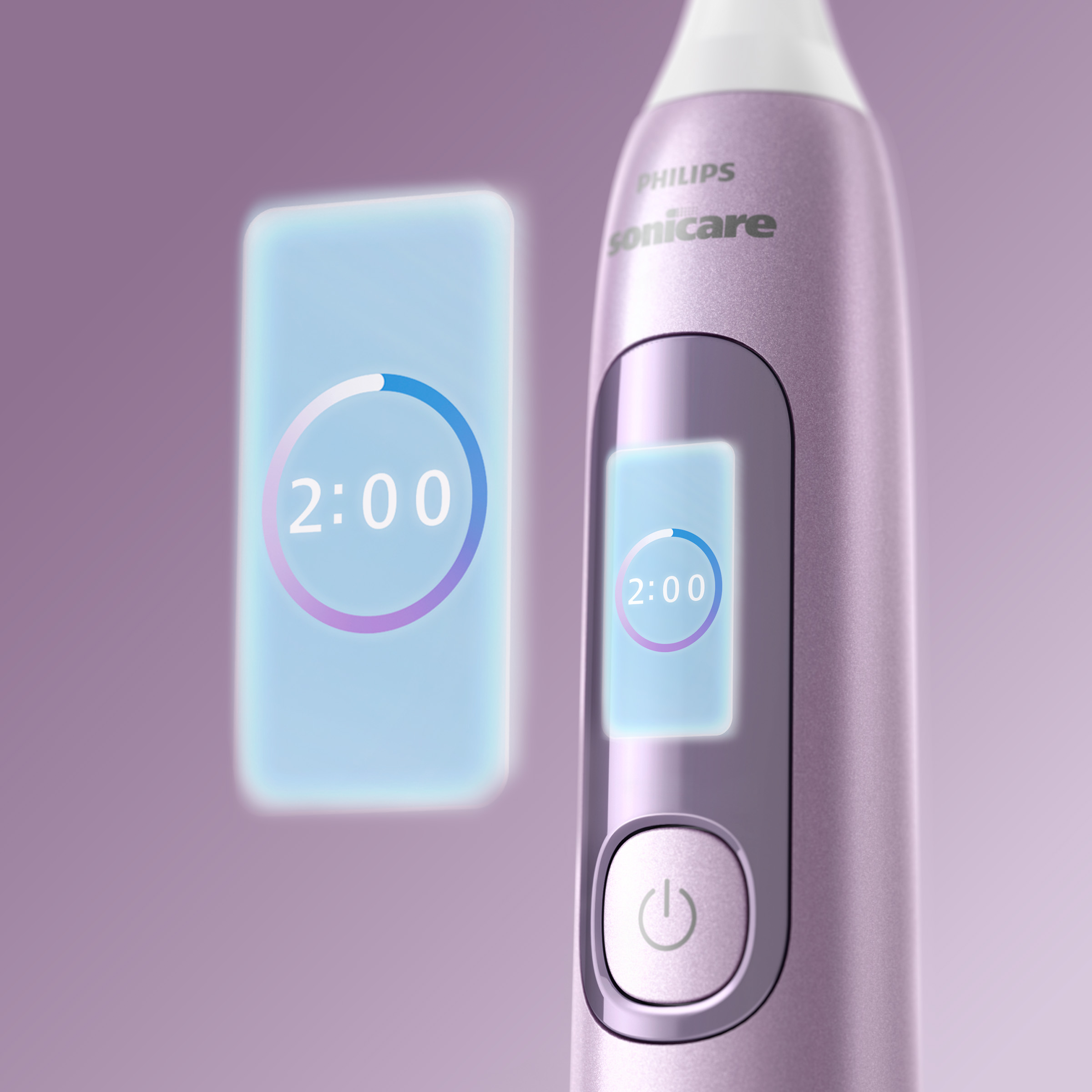 Fioletowa szczoteczka elektryczna z timerem 2:00 na wyświetlaczu.