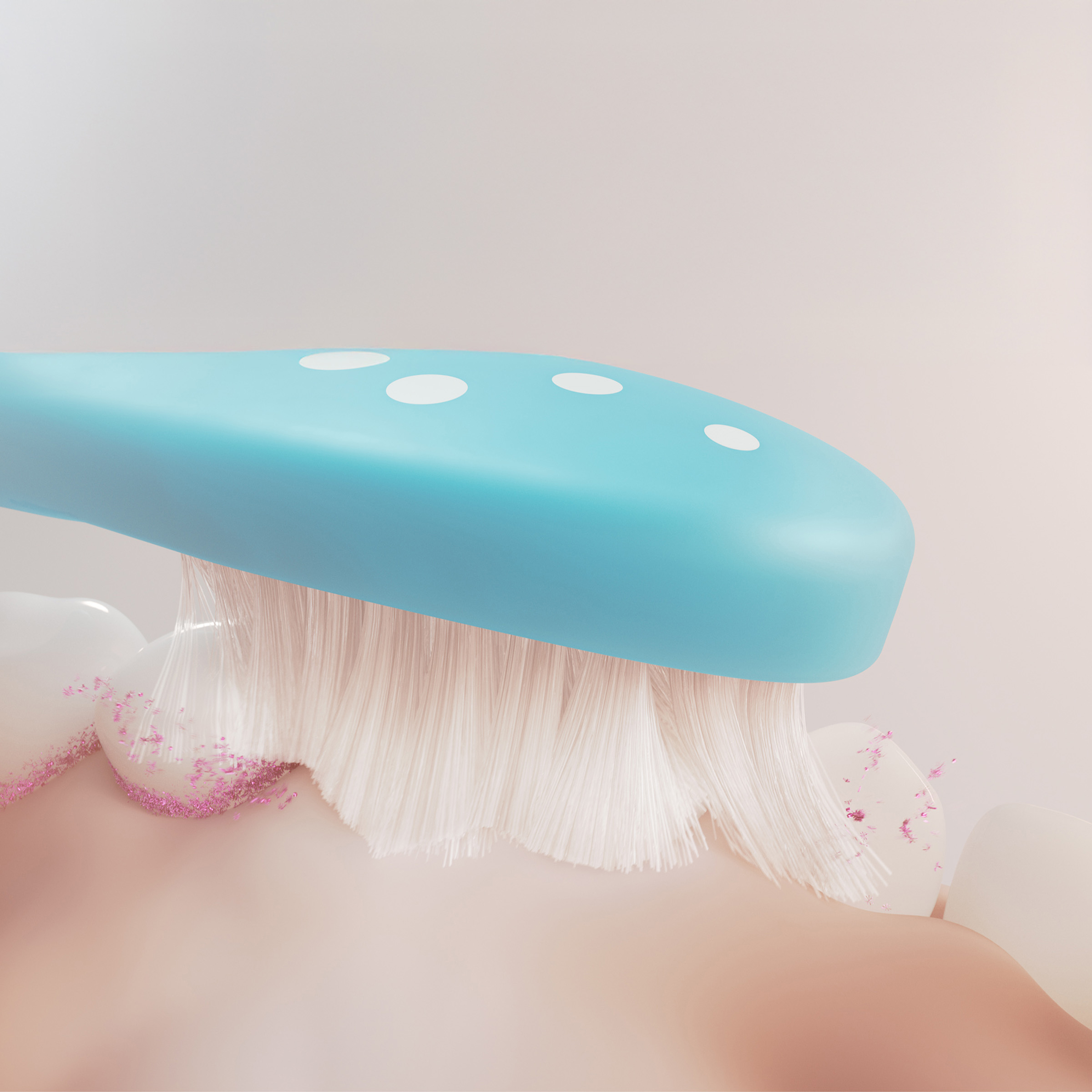 Niebieska szczoteczka czyści zęby z różowymi cząsteczkami.