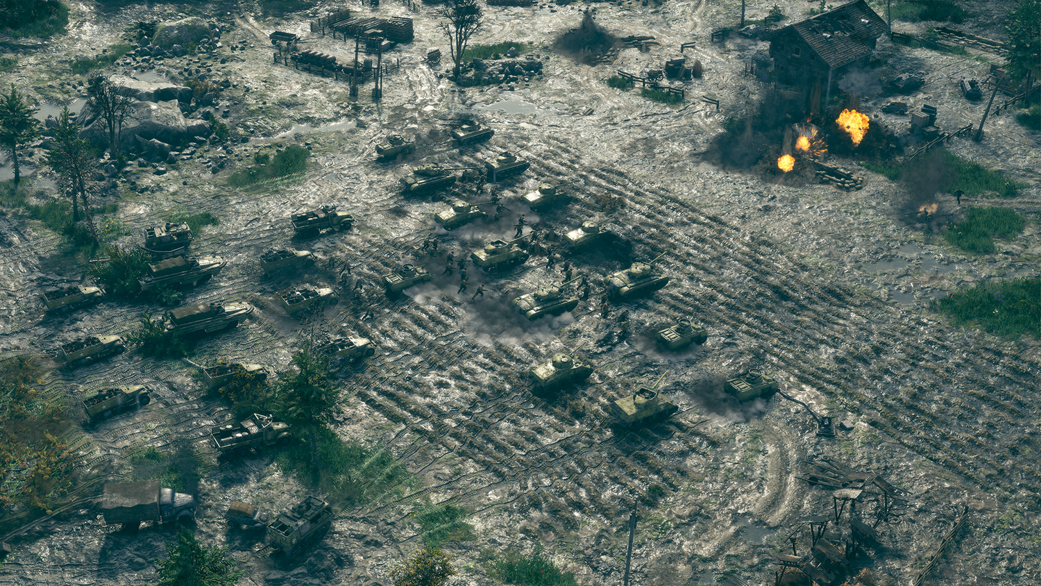 Una escena de guerra con tanques, soldados y un edificio en llamas.