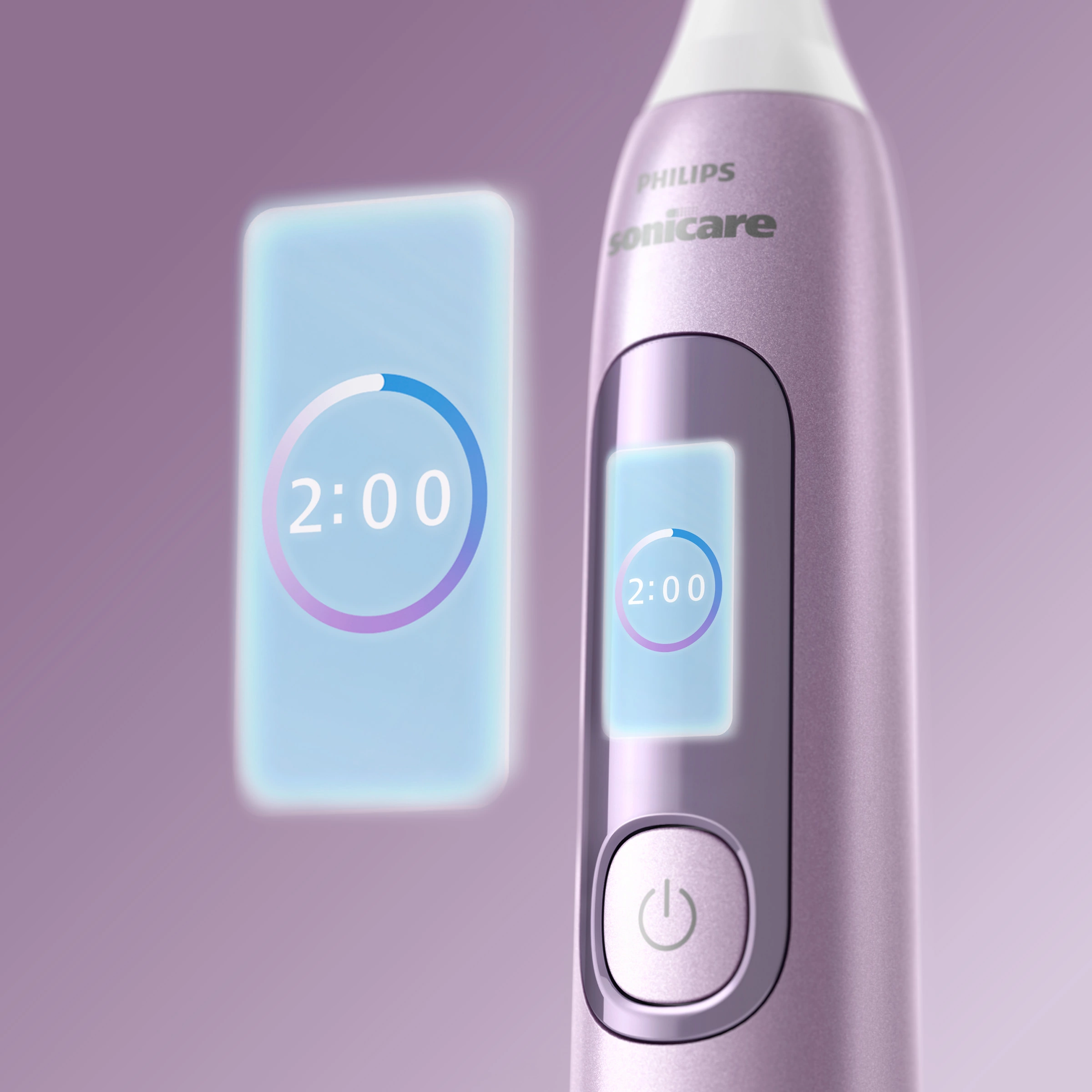 Fioletowa główka szczoteczki elektrycznej z włączonym przyciskiem i timerem.
