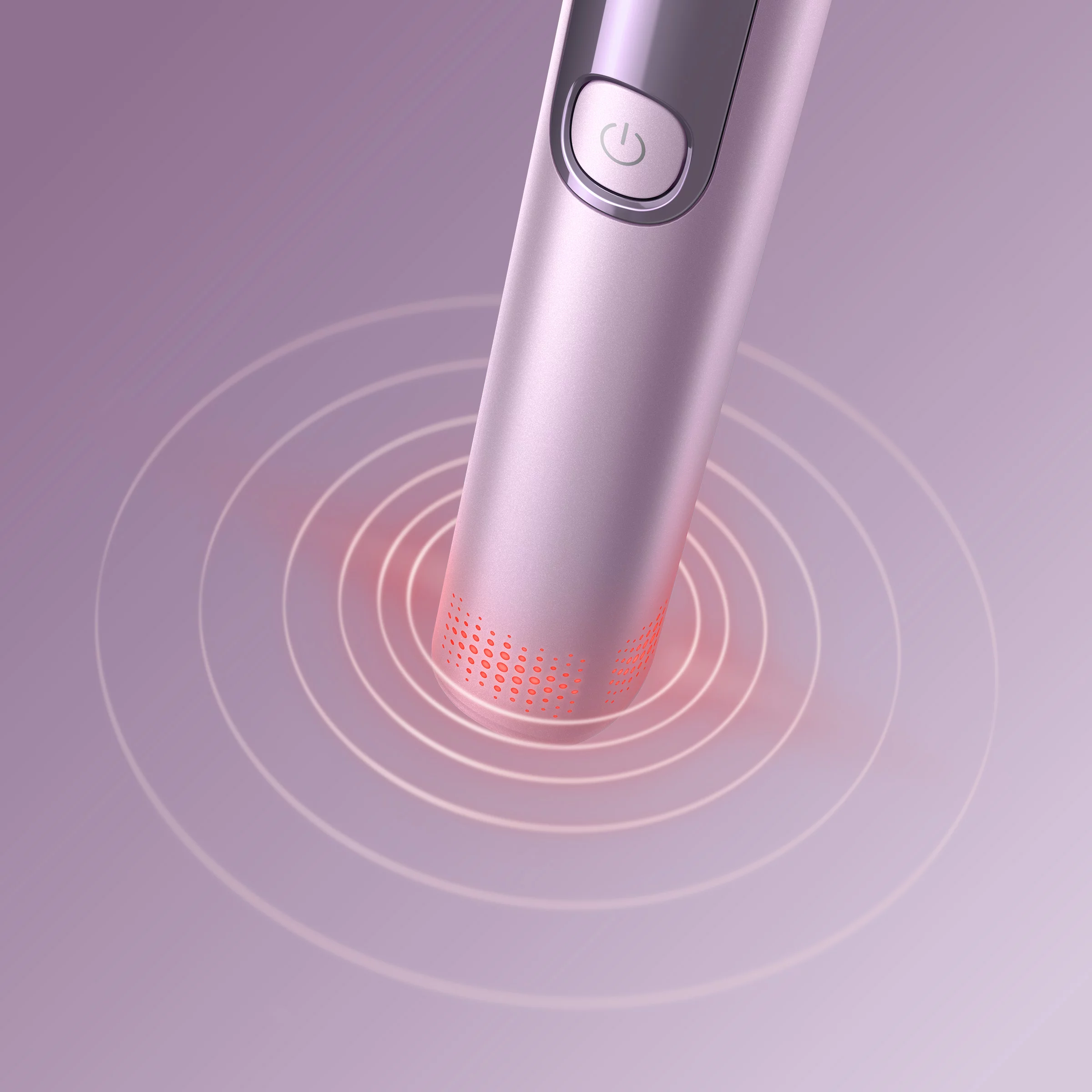 Srebrne urządzenie z przyciskiem zasilania i czerwonymi światłami emitującymi fale.