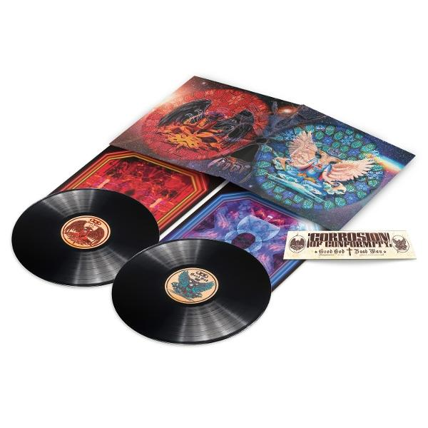 Zwei schwarze Schallplatten liegen vor bunten Albumcovern mit mystischen Bildern.