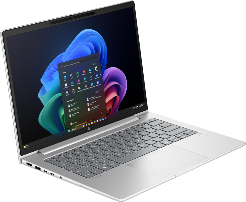 Silberner Laptop mit einem bunten Windows-Startmenü auf dem Bildschirm.