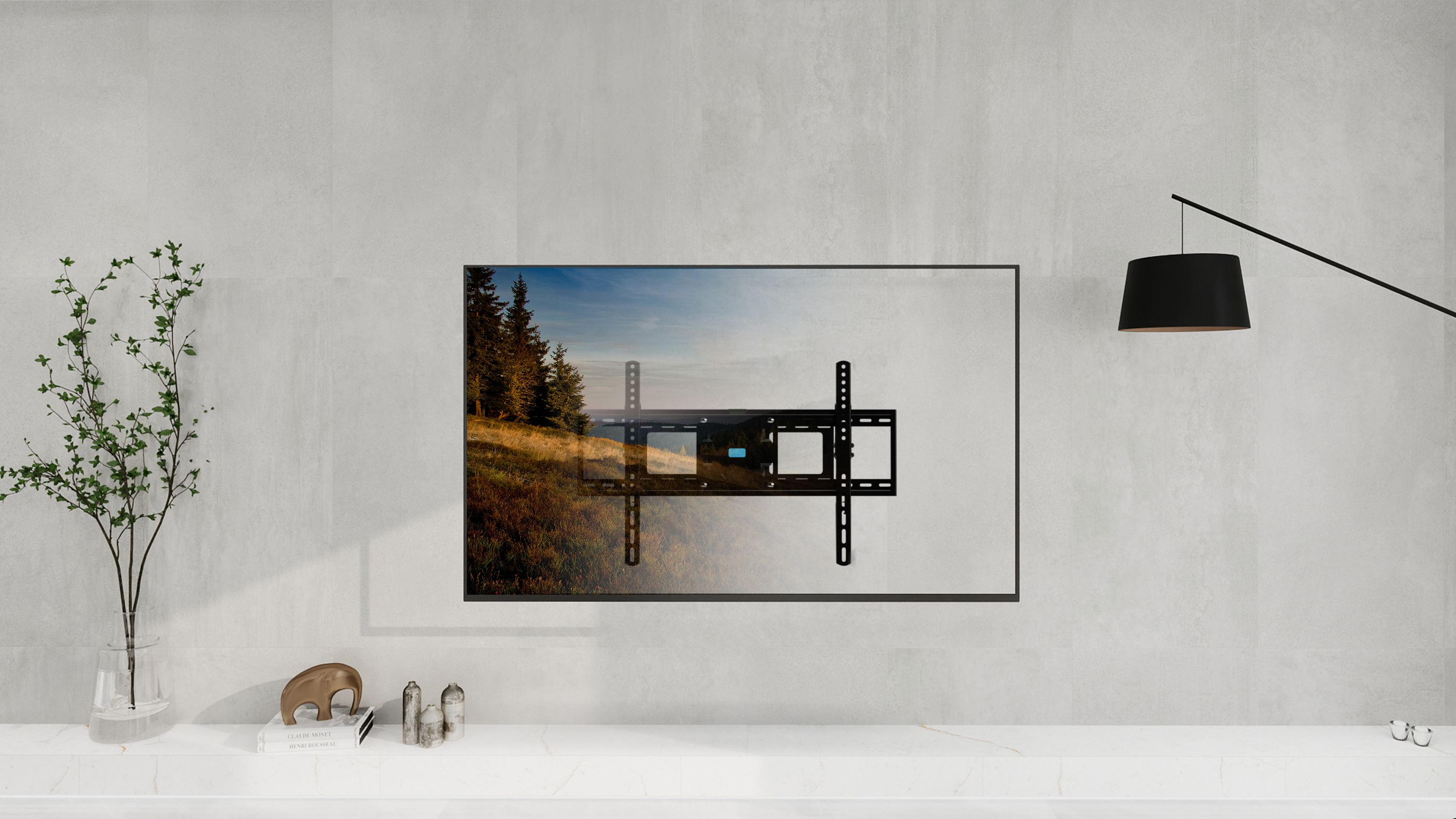 Telewizor z czarnym uchwytem pokazuje krajobraz leśny. Po prawej wisi lampa.