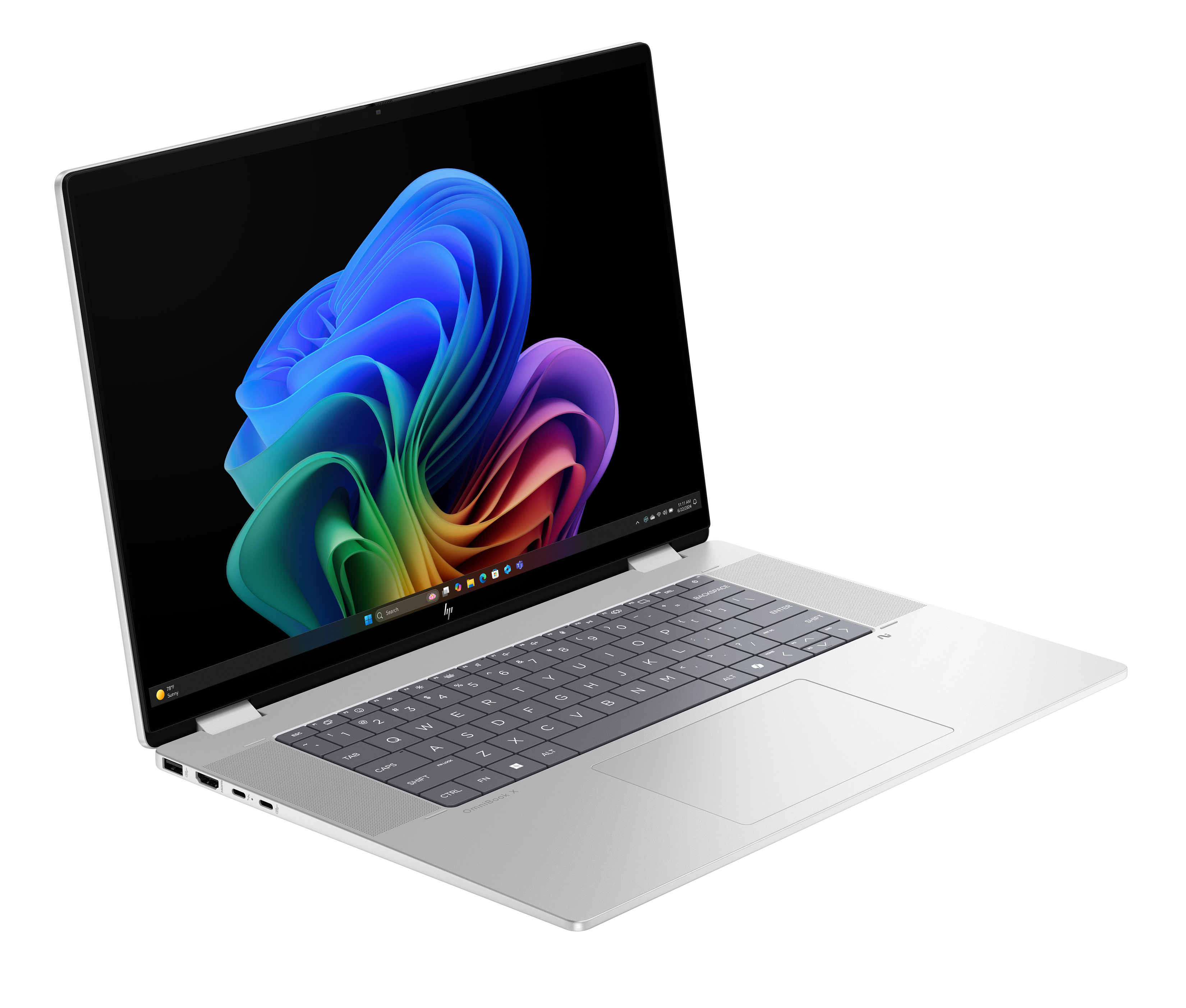 Otwarty srebrny laptop z kolorową tapetą i klawiaturą.