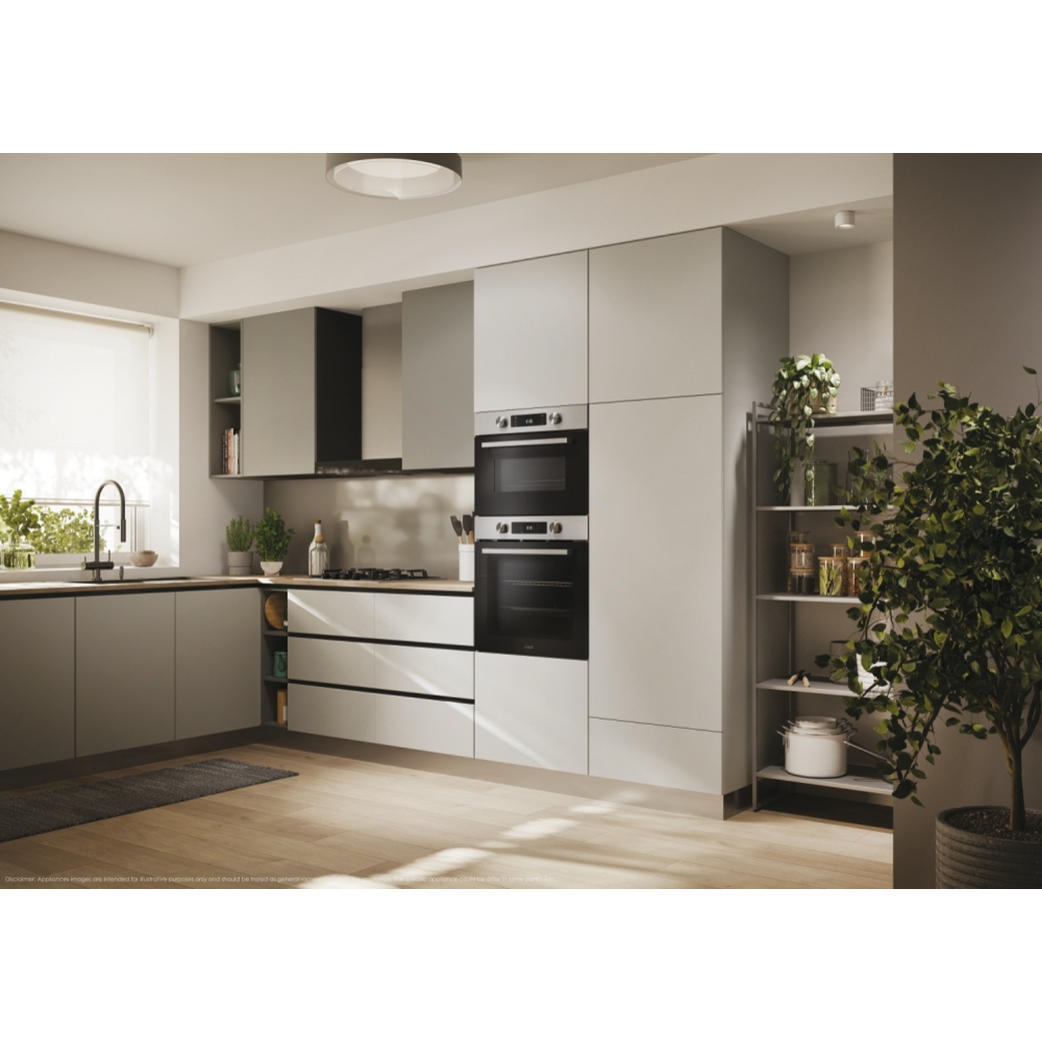 Cucina moderna con mobili grigi, due forni, piano cottura e pavimento in legno.