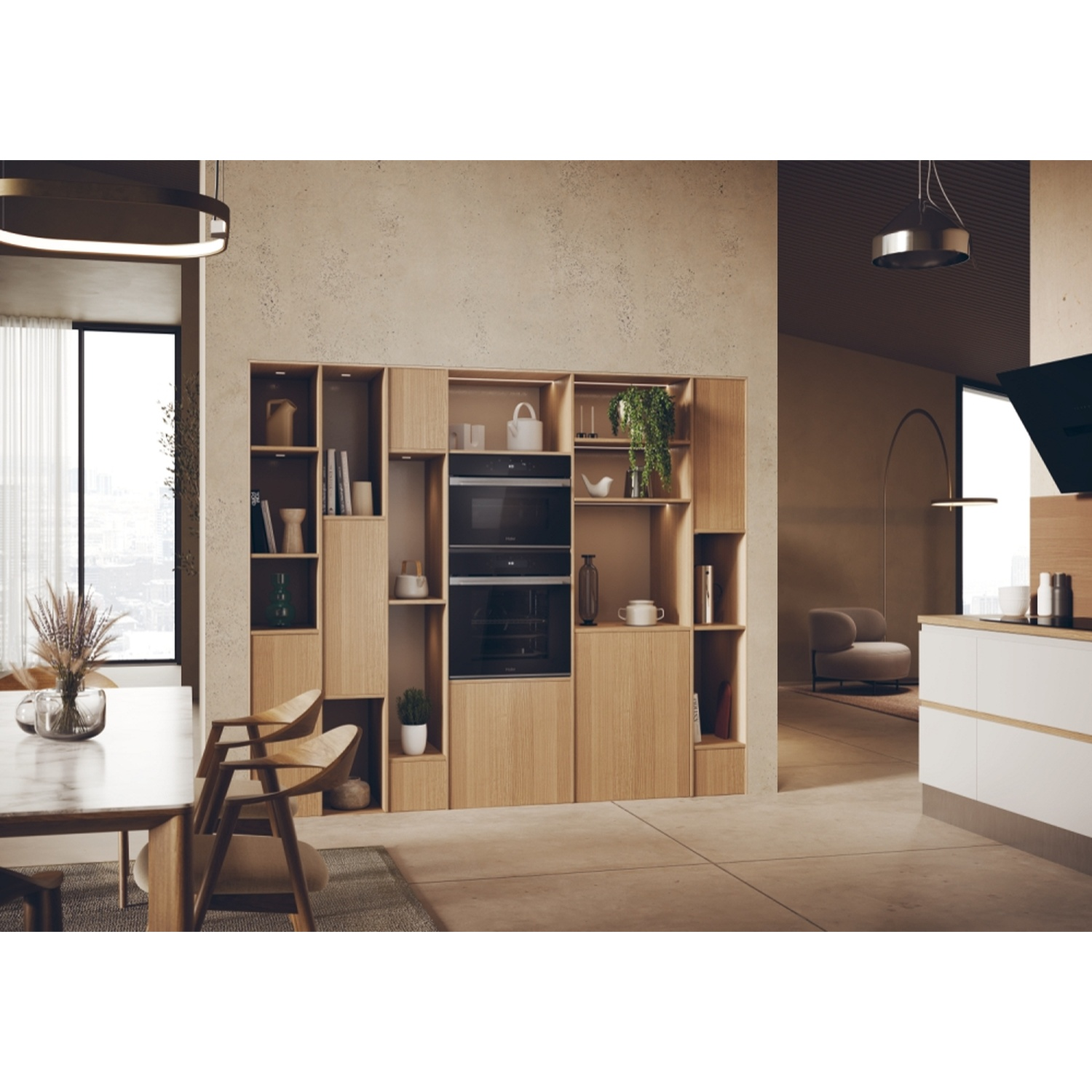 Cucina moderna con mobili in legno, forni da incasso e zona pranzo.