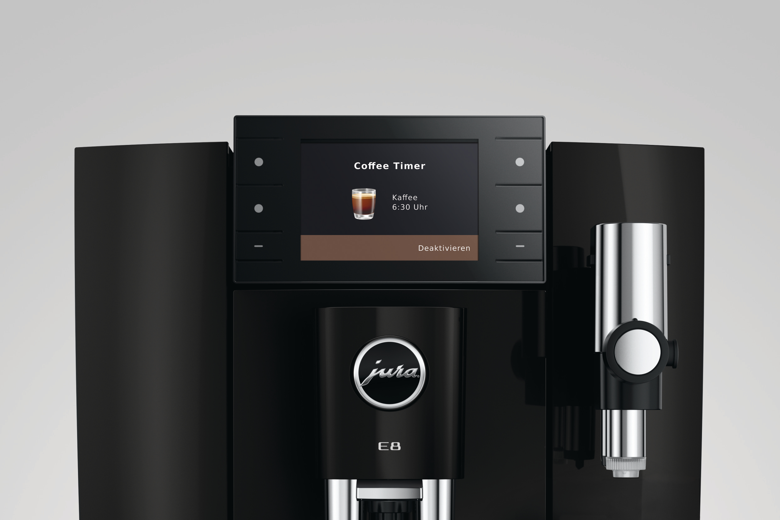 Schwarze Jura E8 Kaffeemaschine mit digitalem Display, das einen Kaffee anzeigt.