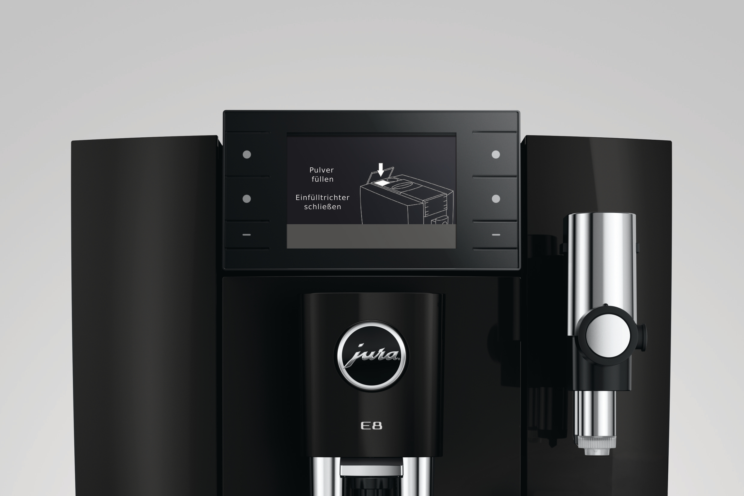 Schwarze Kaffeemaschine mit Touchscreen, der das Befüllen von Pulver anzeigt.