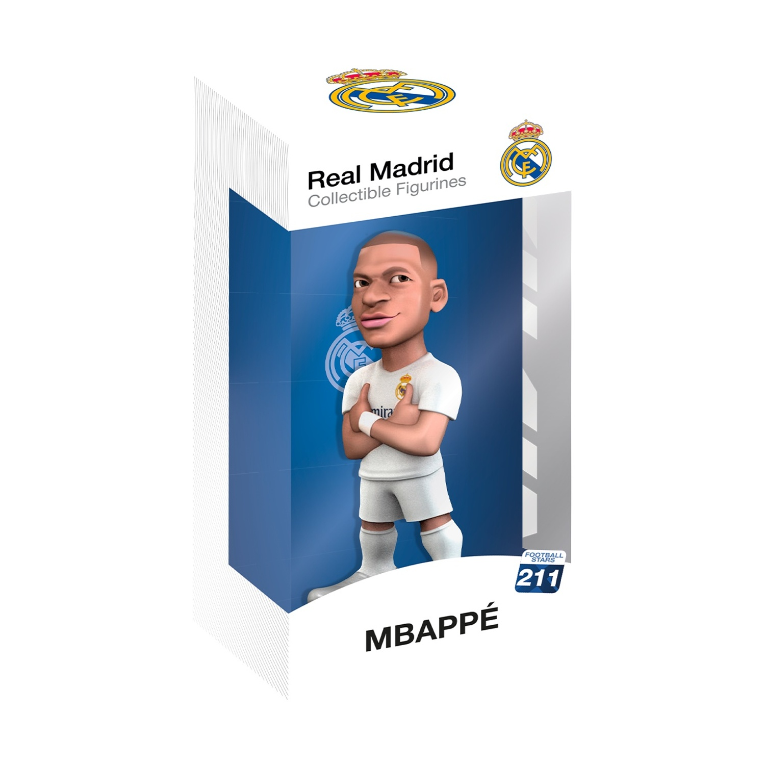 Una figurina da collezione del Real Madrid di Mbappé in maglia e pantaloncini bianchi.