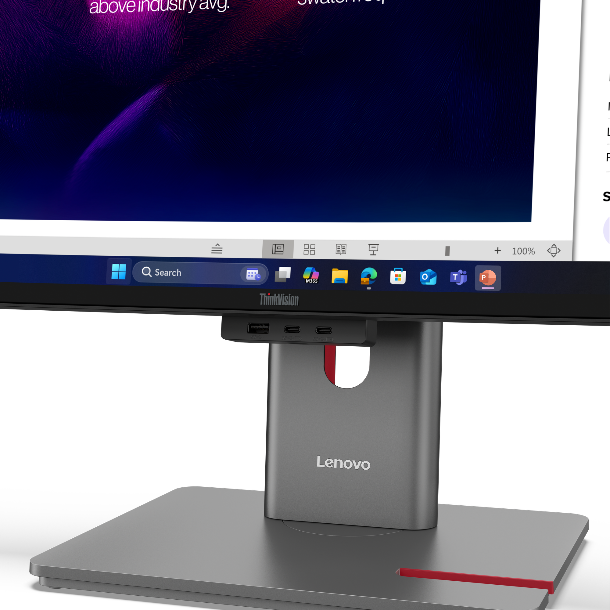 Ein Lenovo Monitor mit Suchleiste und App-Symbolen vor dunklem Hintergrund.