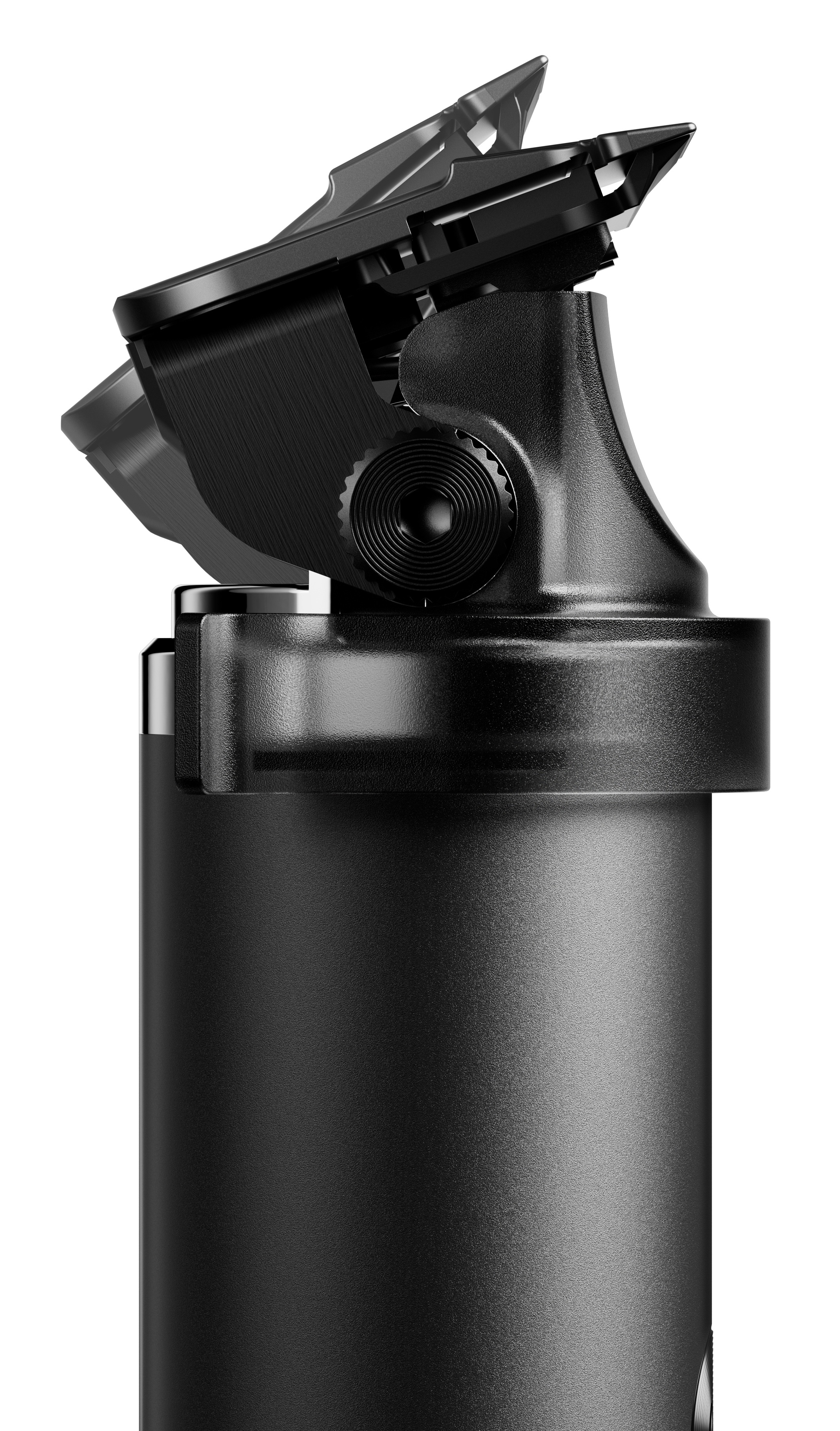 Zbliżenie czarnej maszynki do strzyżenia włosów z teksturowanym korpusem i regulowanym mechanizmem ostrza, ustawionej pod kątem na białym tle.