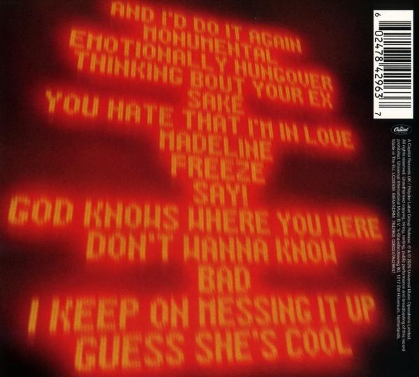 Rote Schrift auf schwarzem Hintergrund: Songtitel wie 'Madeline', 'Freeze', 'Bad'.