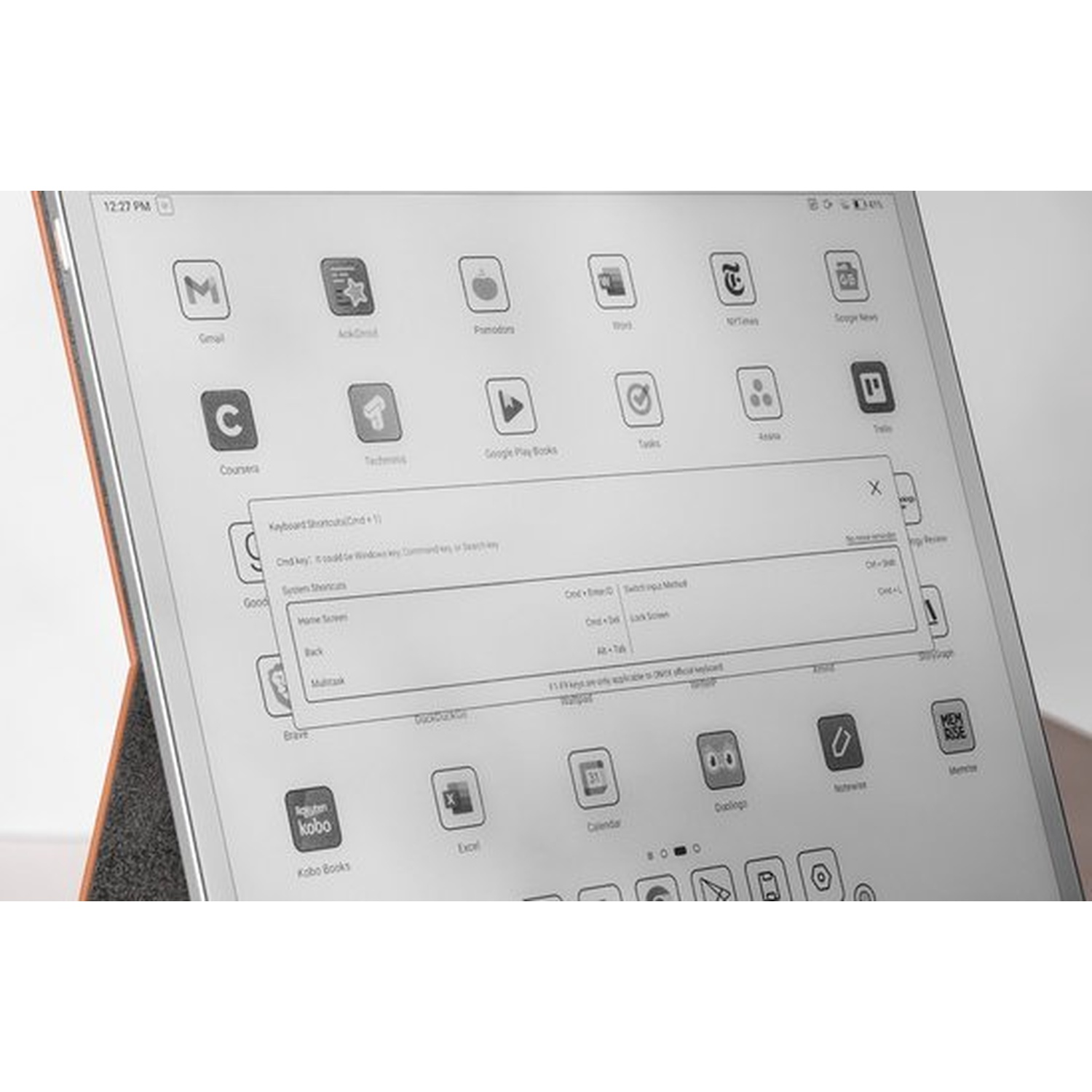 Een tablet toont app-pictogrammen en een pop-upvenster met sneltoetsen.