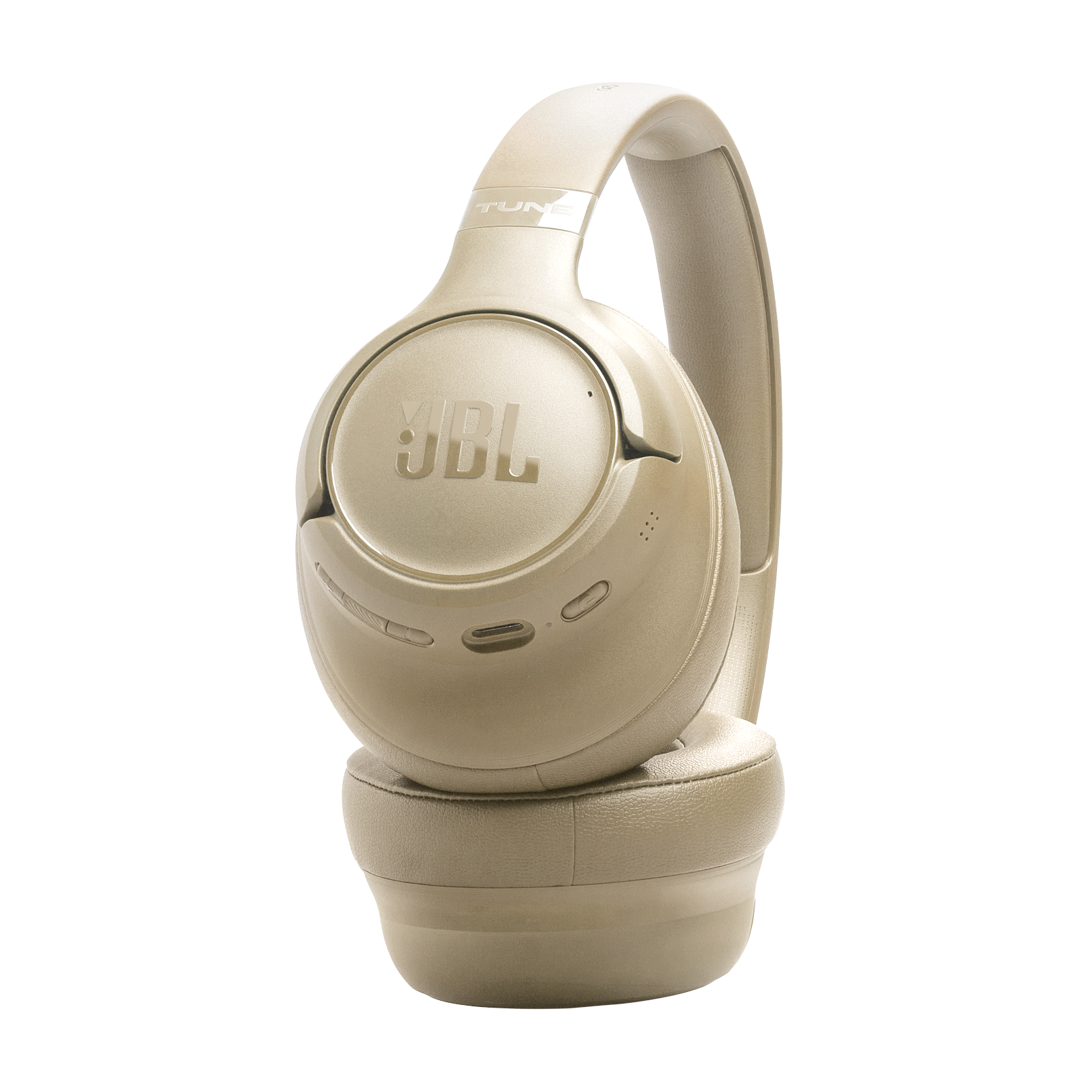 Auriculares JBL beige con cancelación de ruido sobre fondo negro.