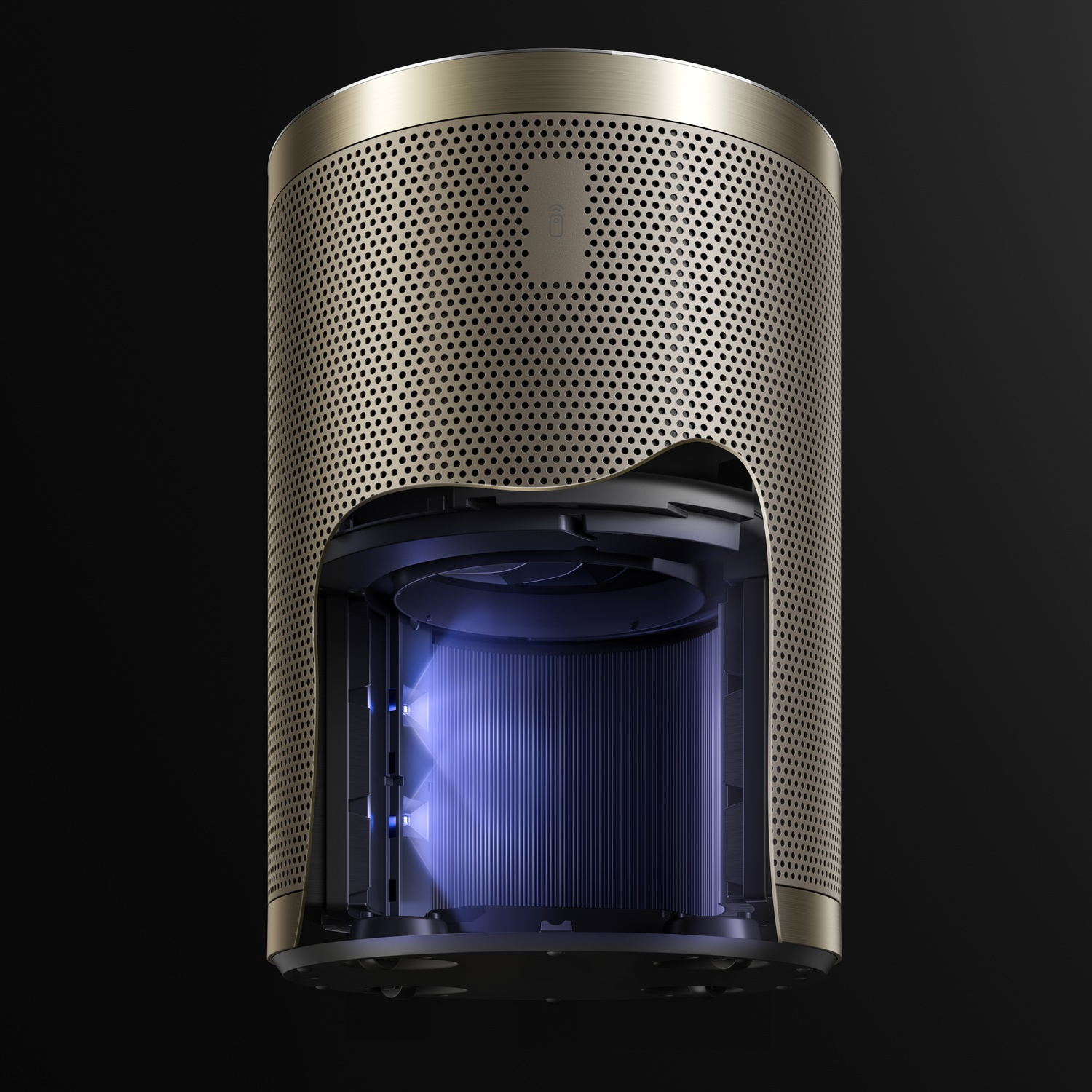 Un purificateur d'air cylindrique avec boîtier doré perforé, ouvert pour montrer l'intérieur.
