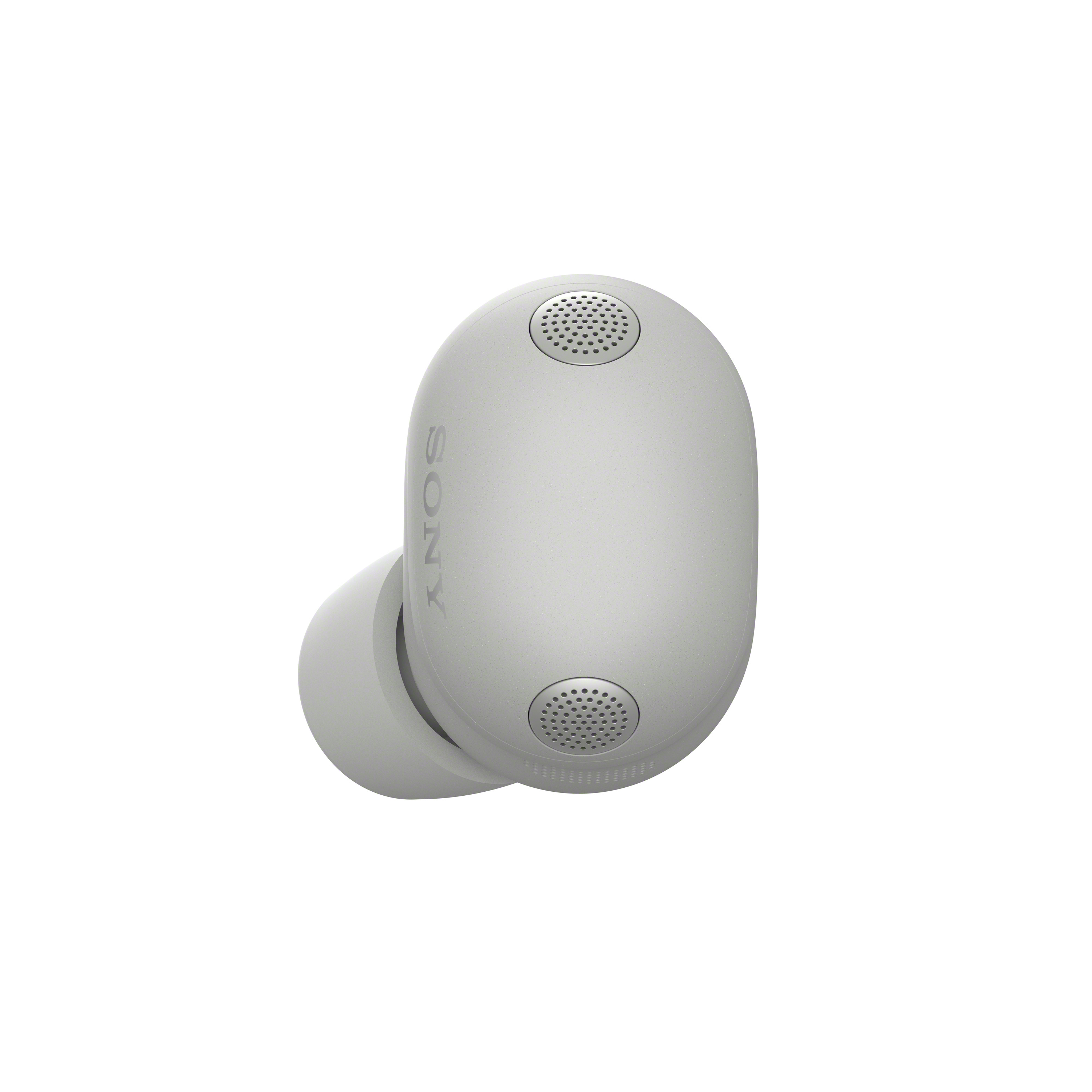 Un écouteur Sony blanc avec des trous de haut-parleur et logo.