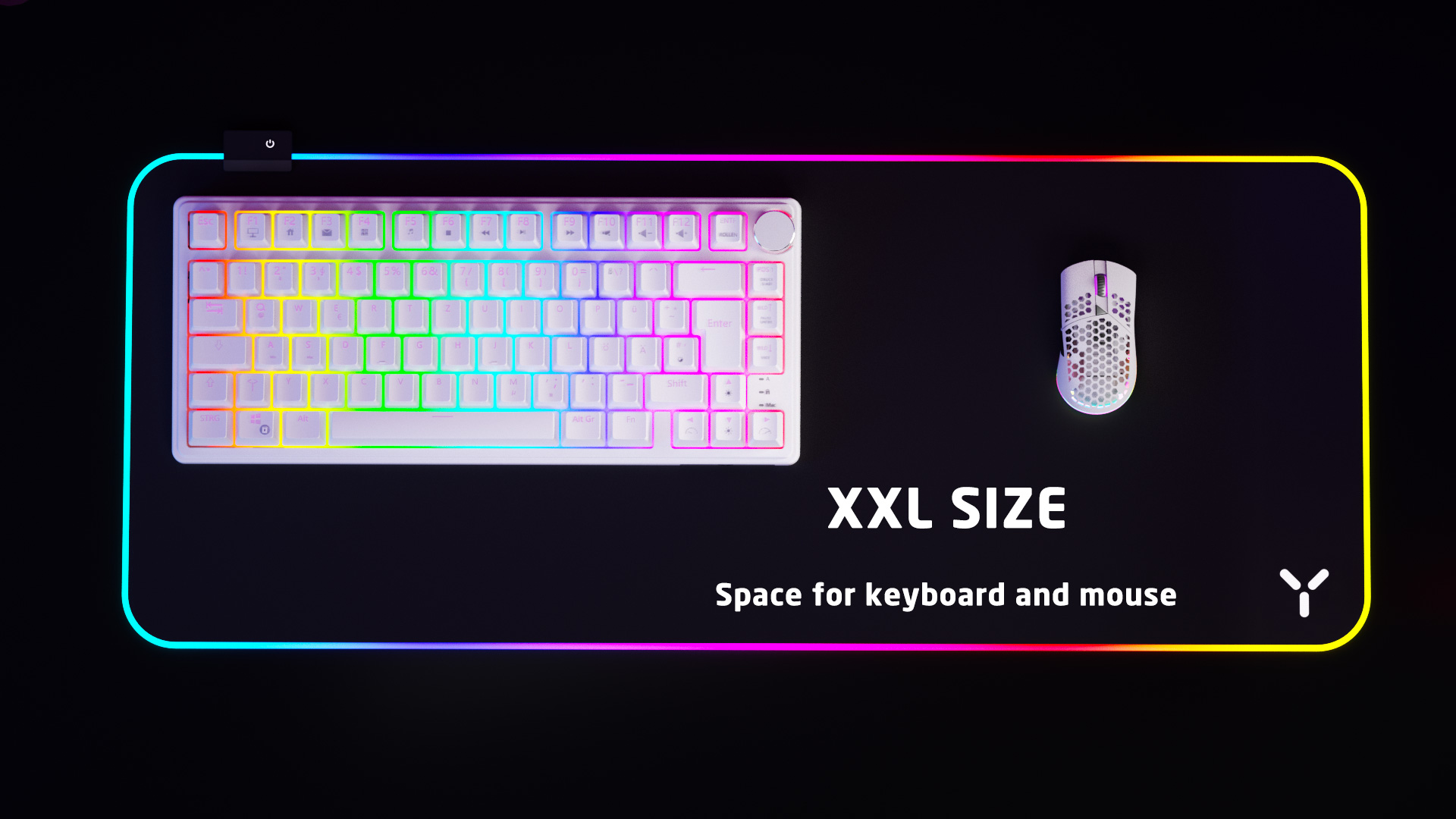 Biała klawiatura i mysz na czarnej podkładce XXL z podświetleniem RGB.