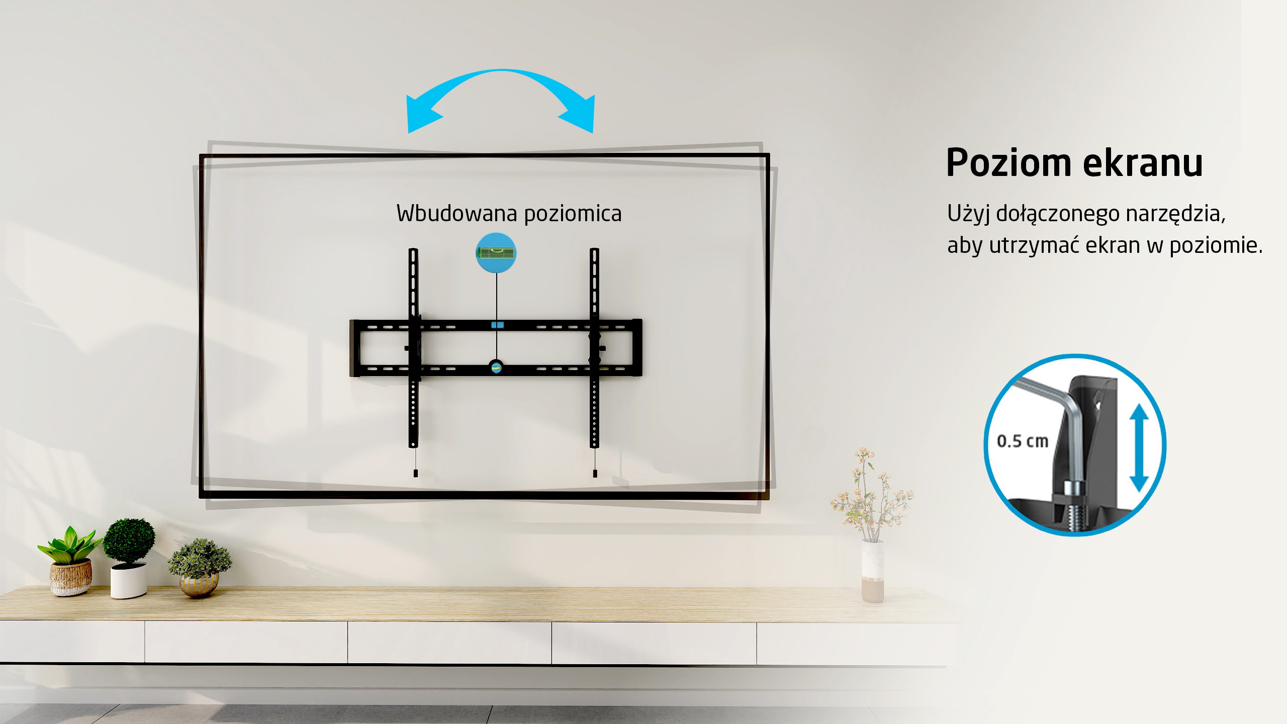 Uchwyt telewizyjny na ścianie z wbudowaną poziomicą do wyrównania.