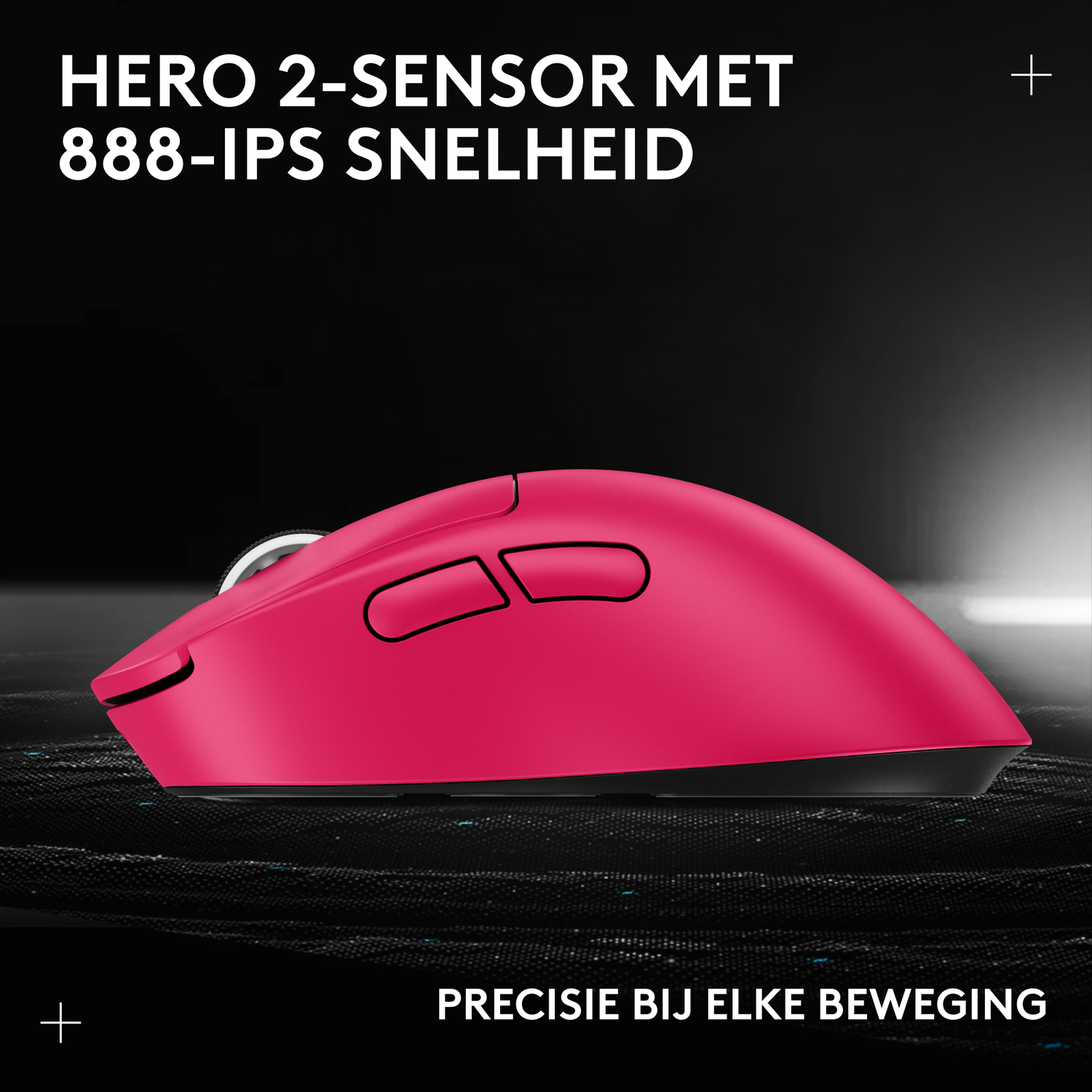 A pink computer mouse with two buttons rests on a black textured surface.