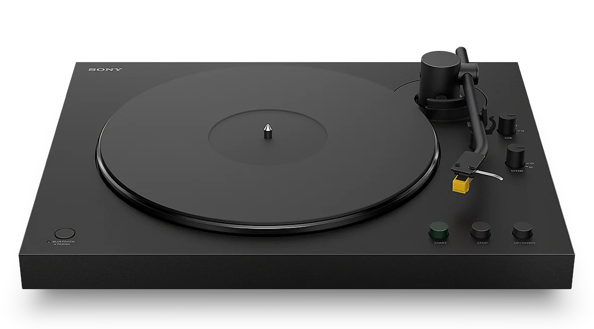 Czarny gramofon z ramieniem, igłą i przyciskami sterowania.