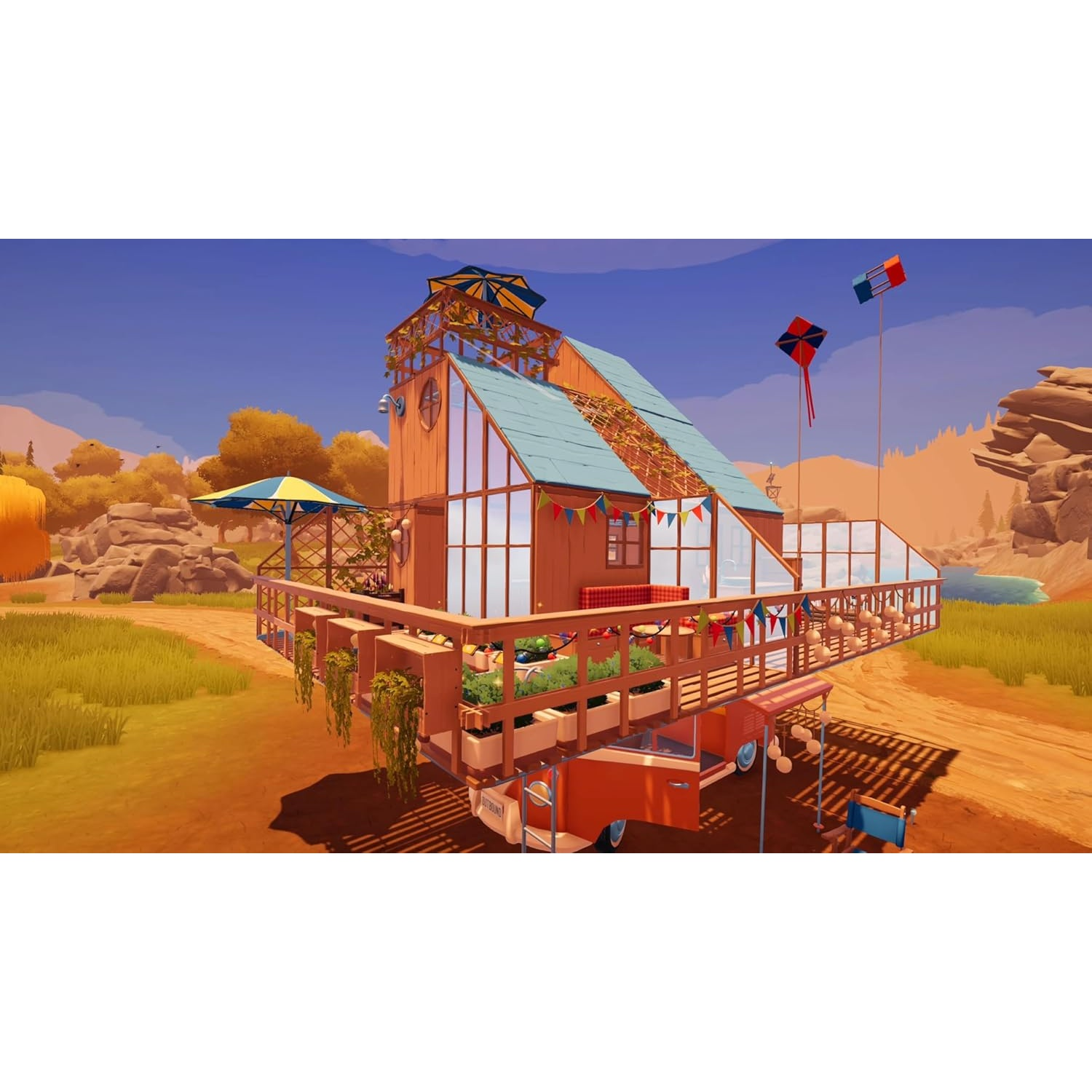 A mobile house with wood siding, glass roof, and a deck in a desert landscape.