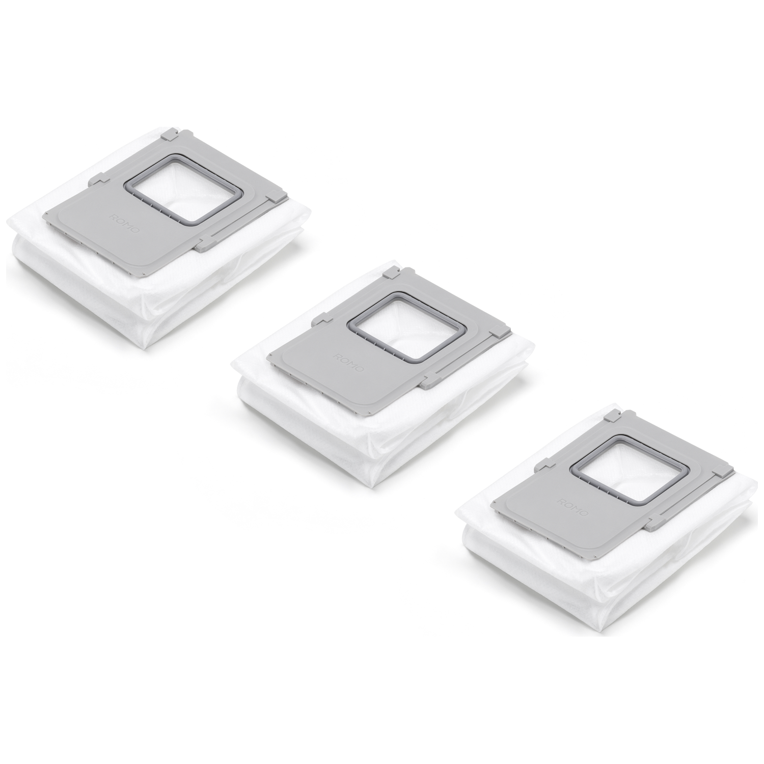Drie witte stofzakken met grijze bovenkanten zijn naast elkaar geplaatst.