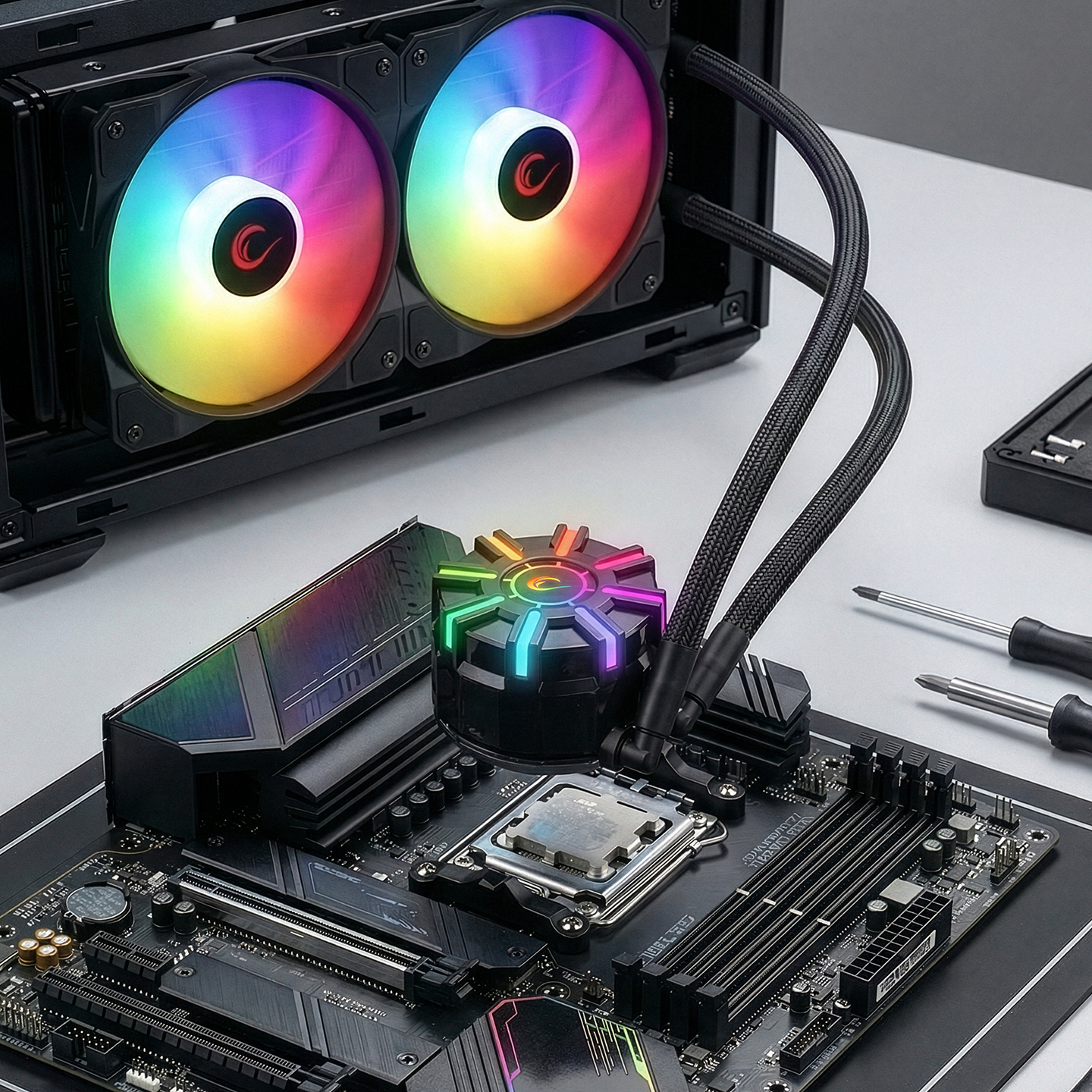 CPU soğutucu, fanlar ve RGB aydınlatmalı bir PC anakartı.