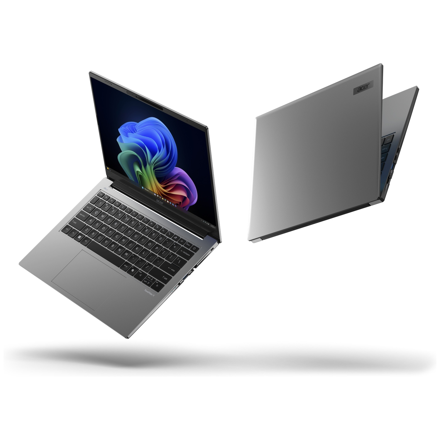Two grey Acer laptops float. One is open showing a colorful screen, one is closed.