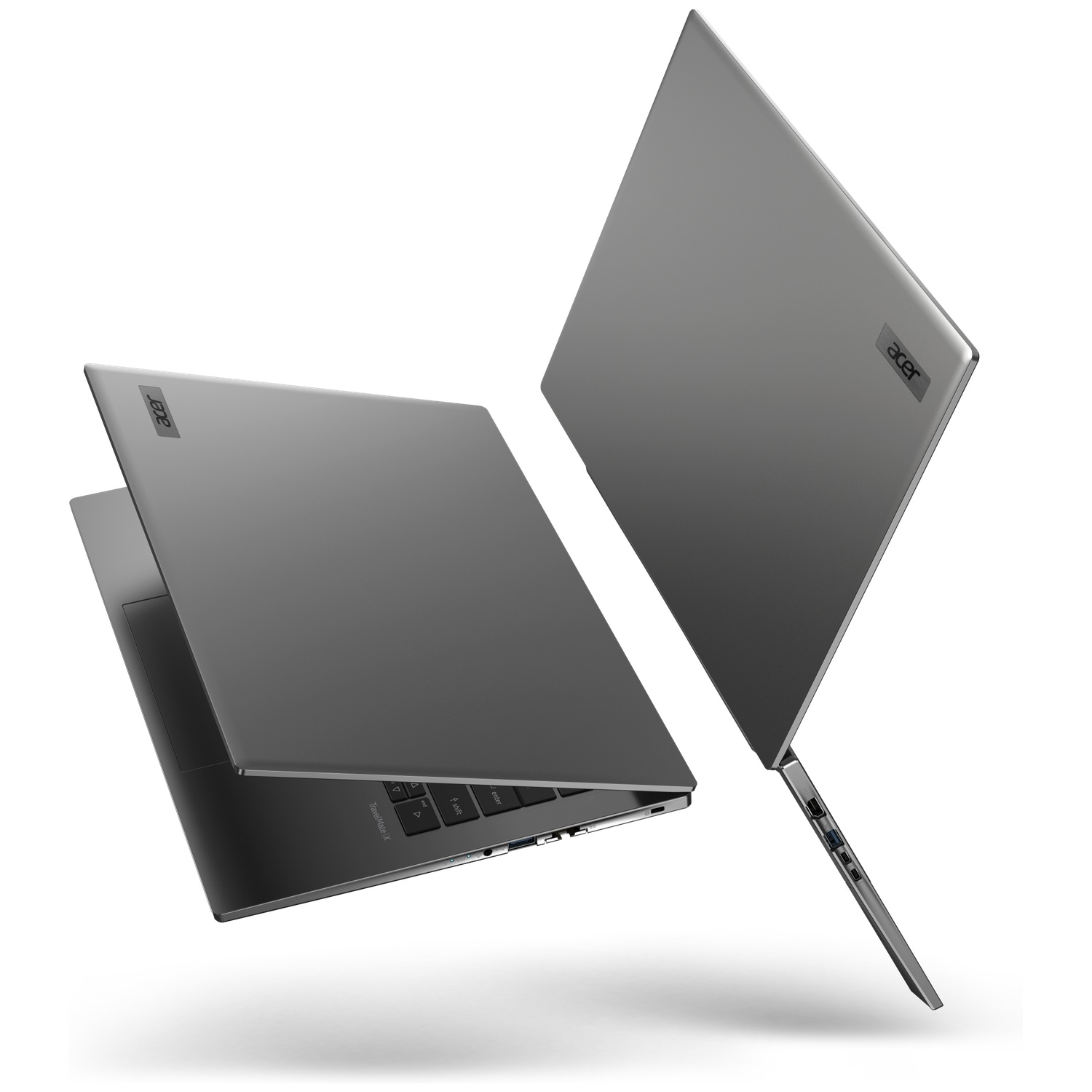 Two gray Acer laptops, one open, one closed, in flight.
