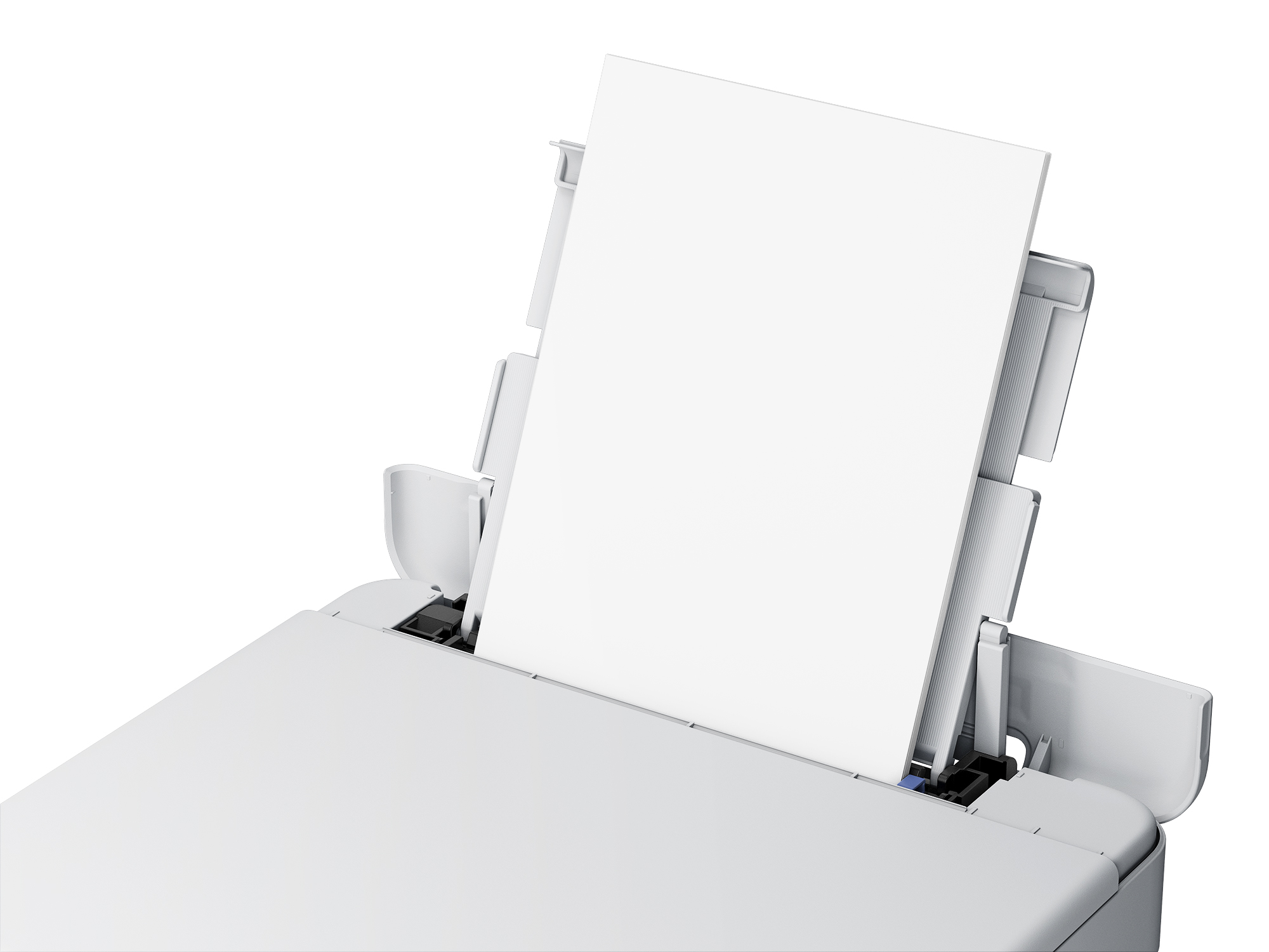 Arkusz białego papieru wystaje z białej drukarki.