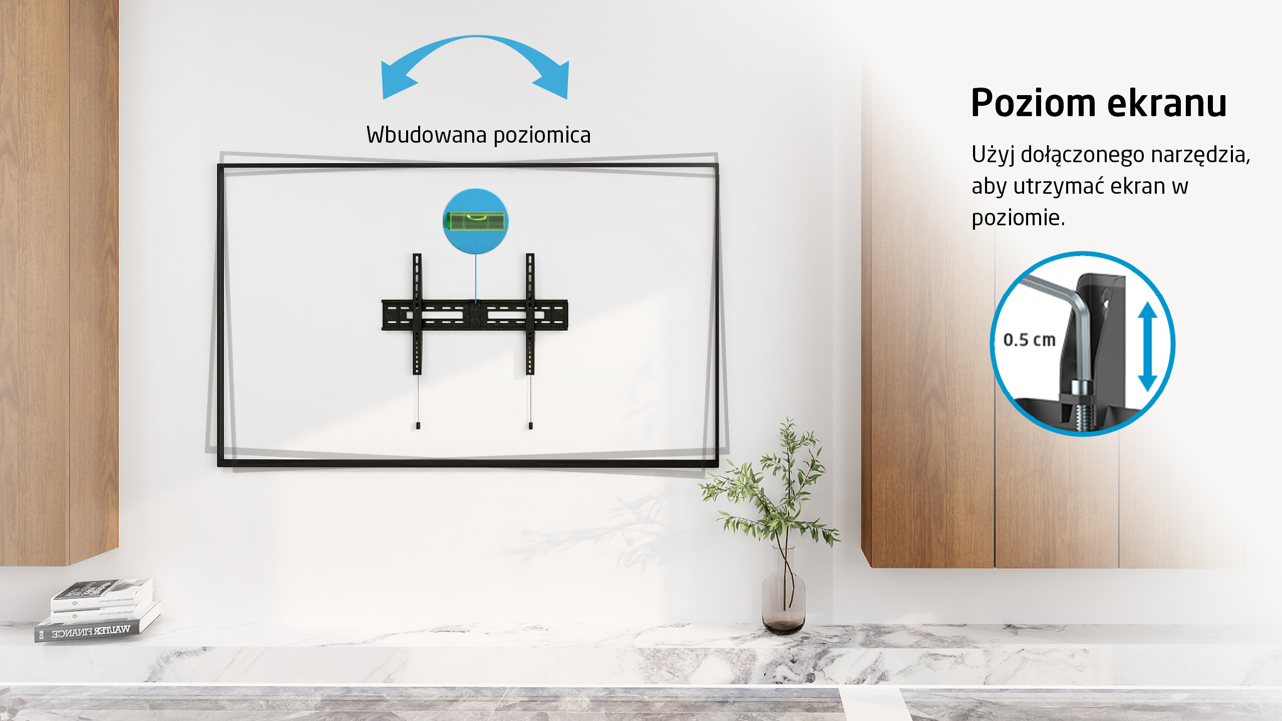 Uchwyt telewizyjny na ścianie z wbudowaną poziomicą do wyrównania.