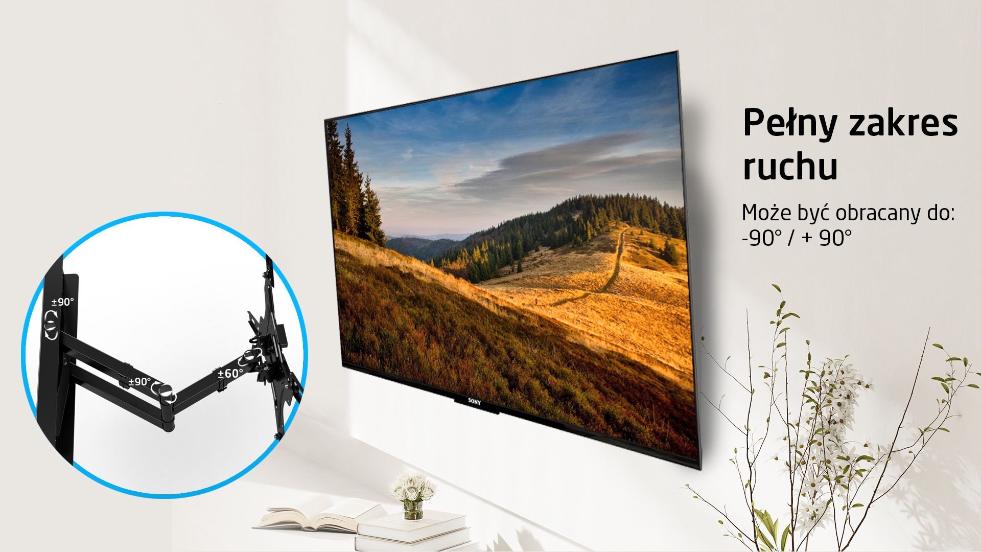 Czarny uchwyt TV z przegubowymi ramionami, obok telewizora z krajobrazem.