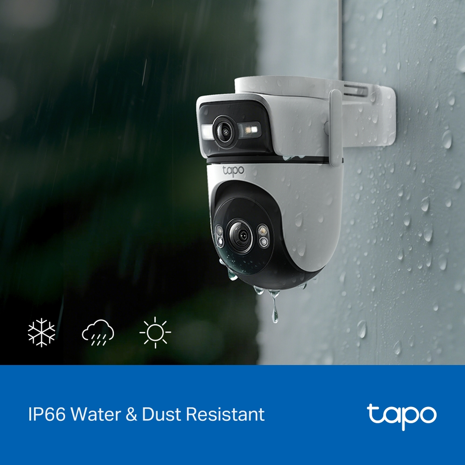 White and black Tapo camera mounted on a wall, with rain drops.